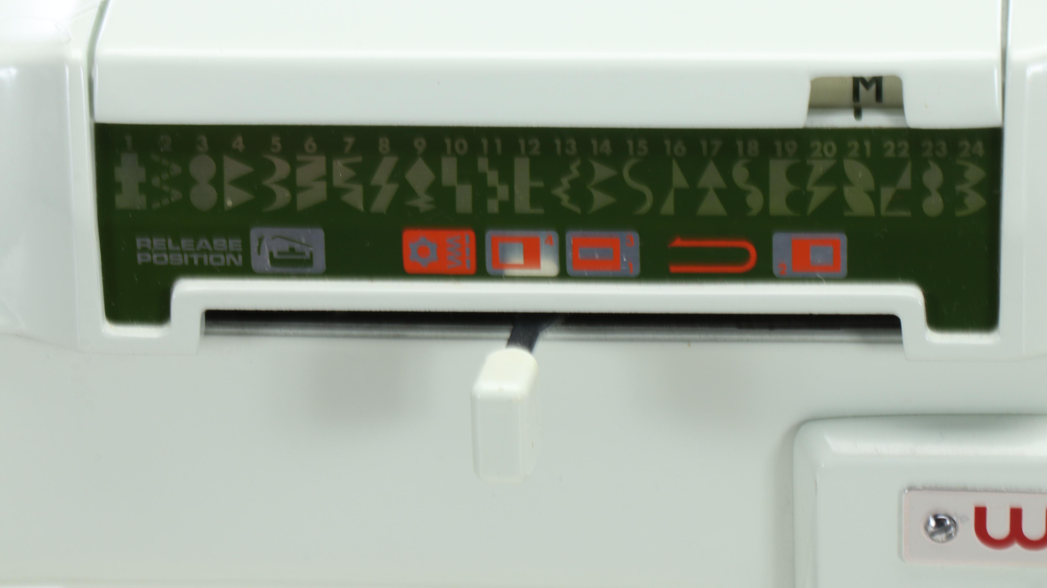 White Electric Sewing Machine with Plastic Carrying Case