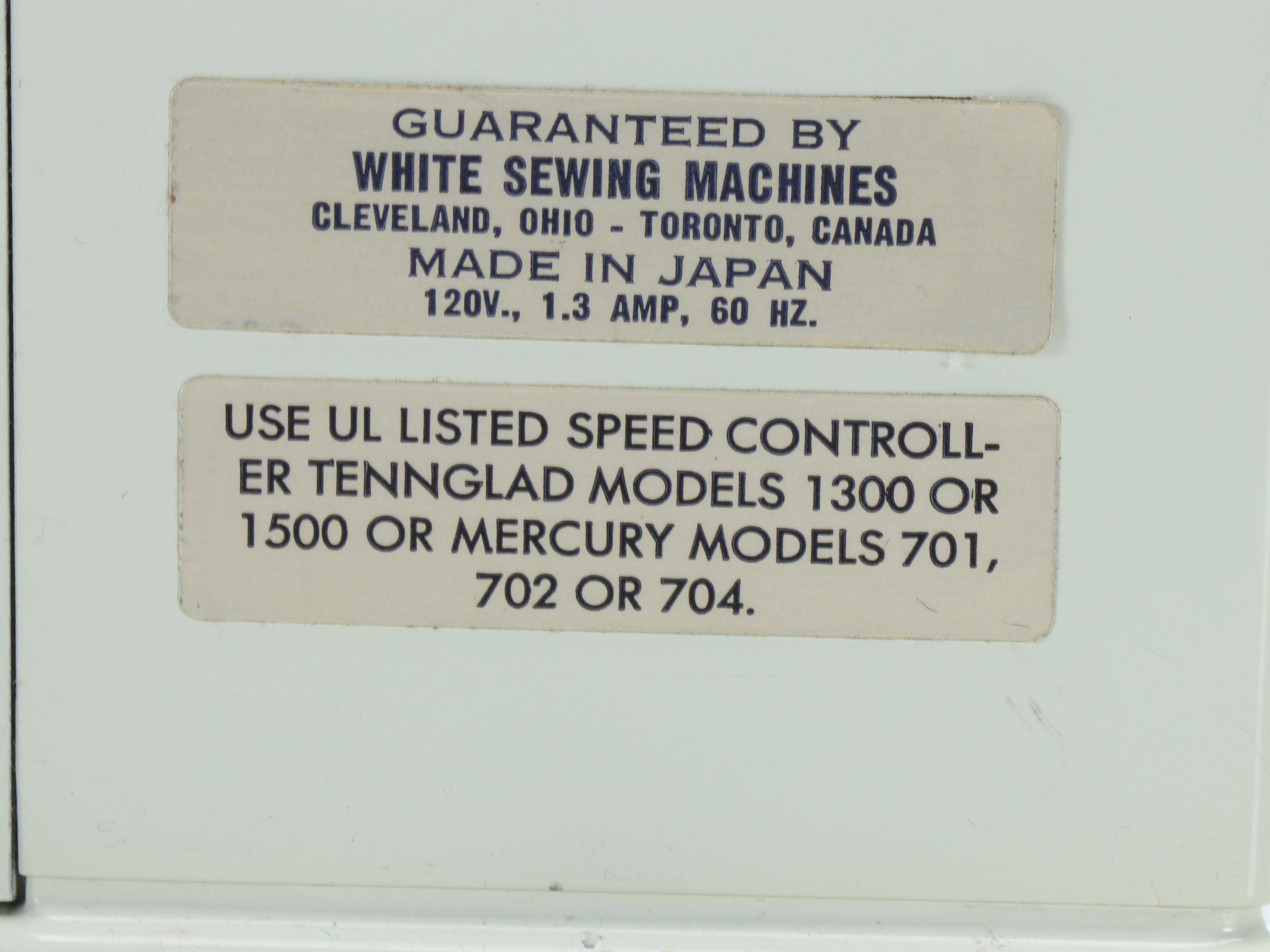 White Electric Sewing Machine with Plastic Carrying Case