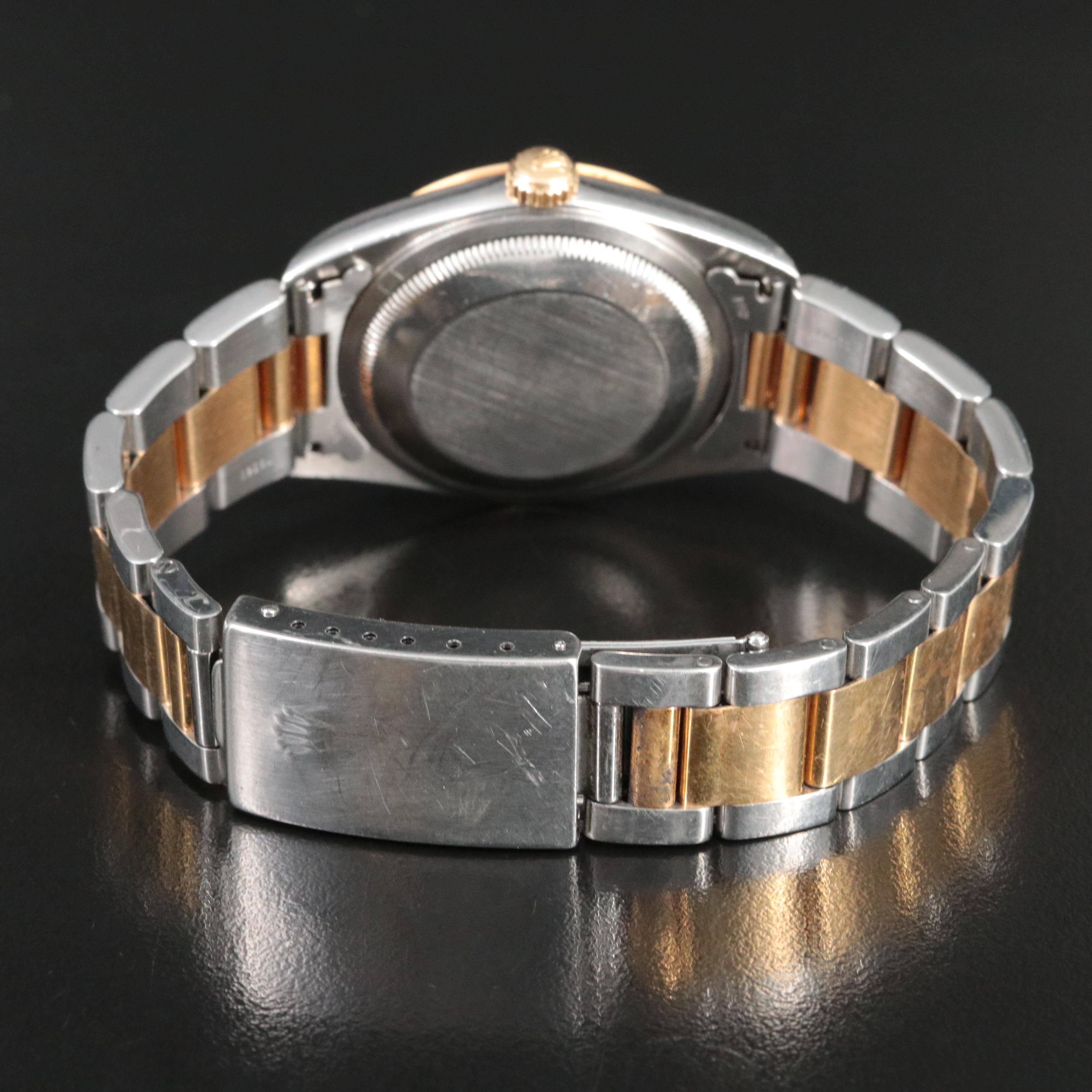 1999 Rolex Datejust 36 White Roman Dial Steel and Gold 16203 Watch