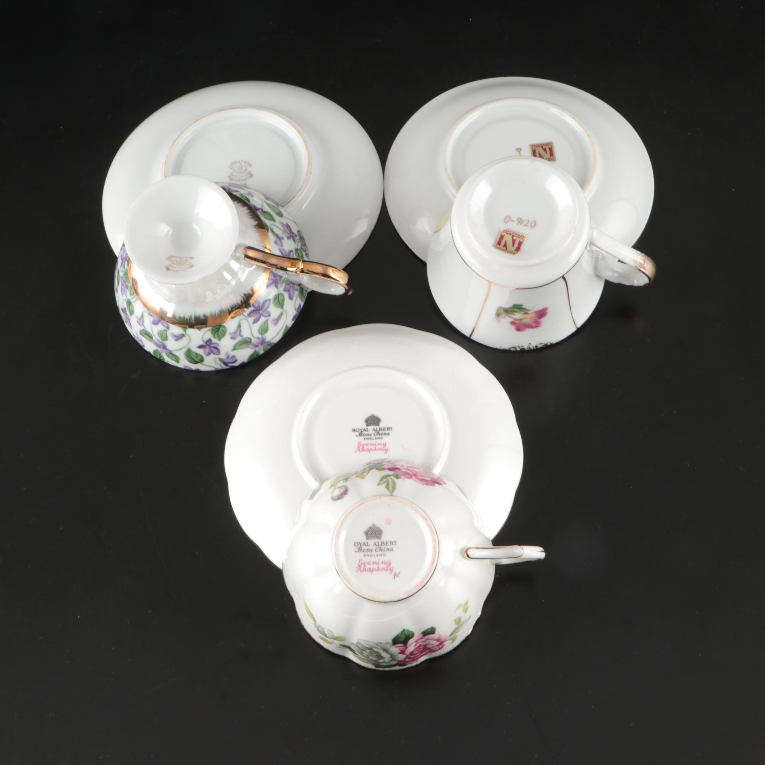 Japanese Satsuma Teapot with Other Demitasse and Teacups, 20th Century