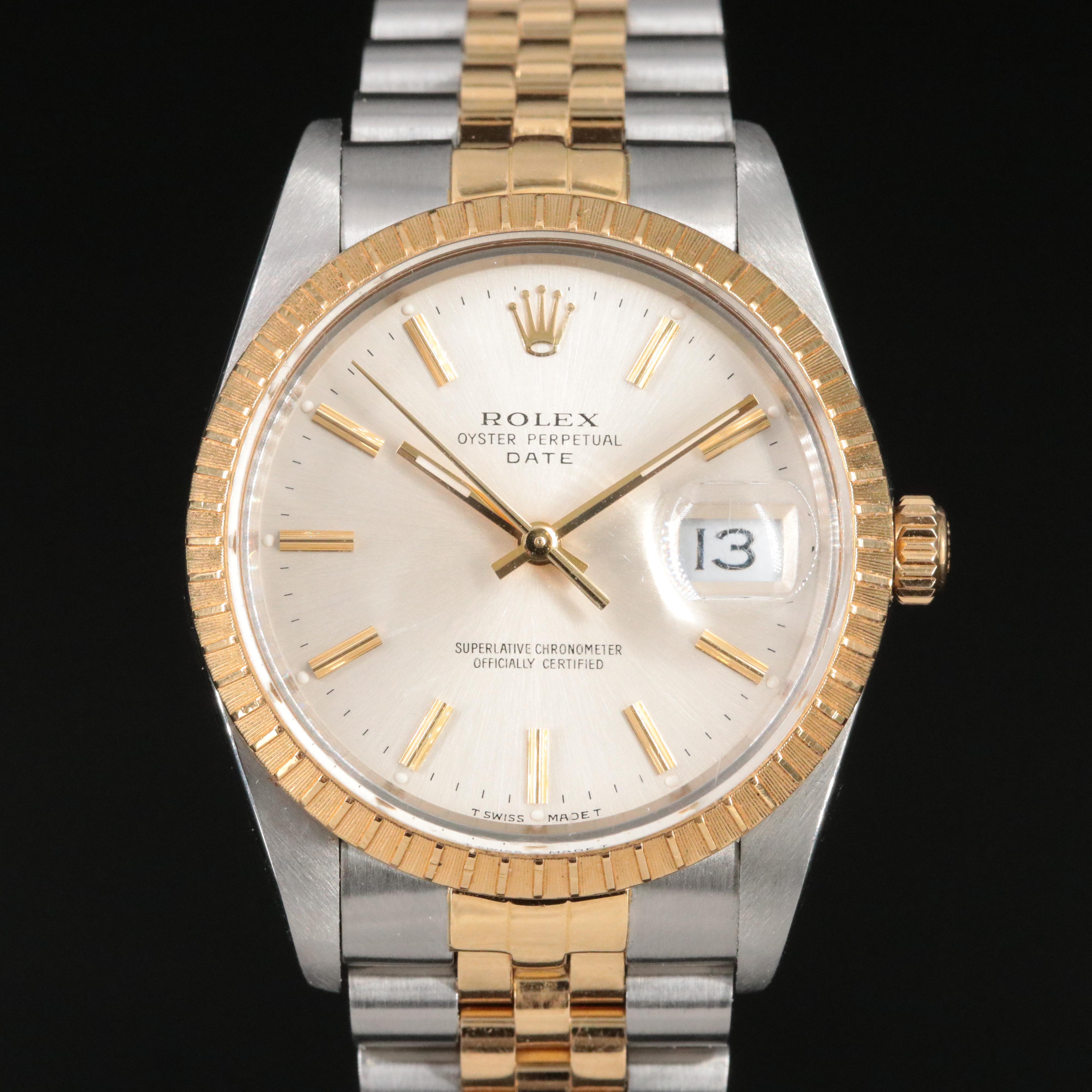 1987-1988 Rolex Oyster Perpetual Date Model 15053 Engine Turned Bezel Watch