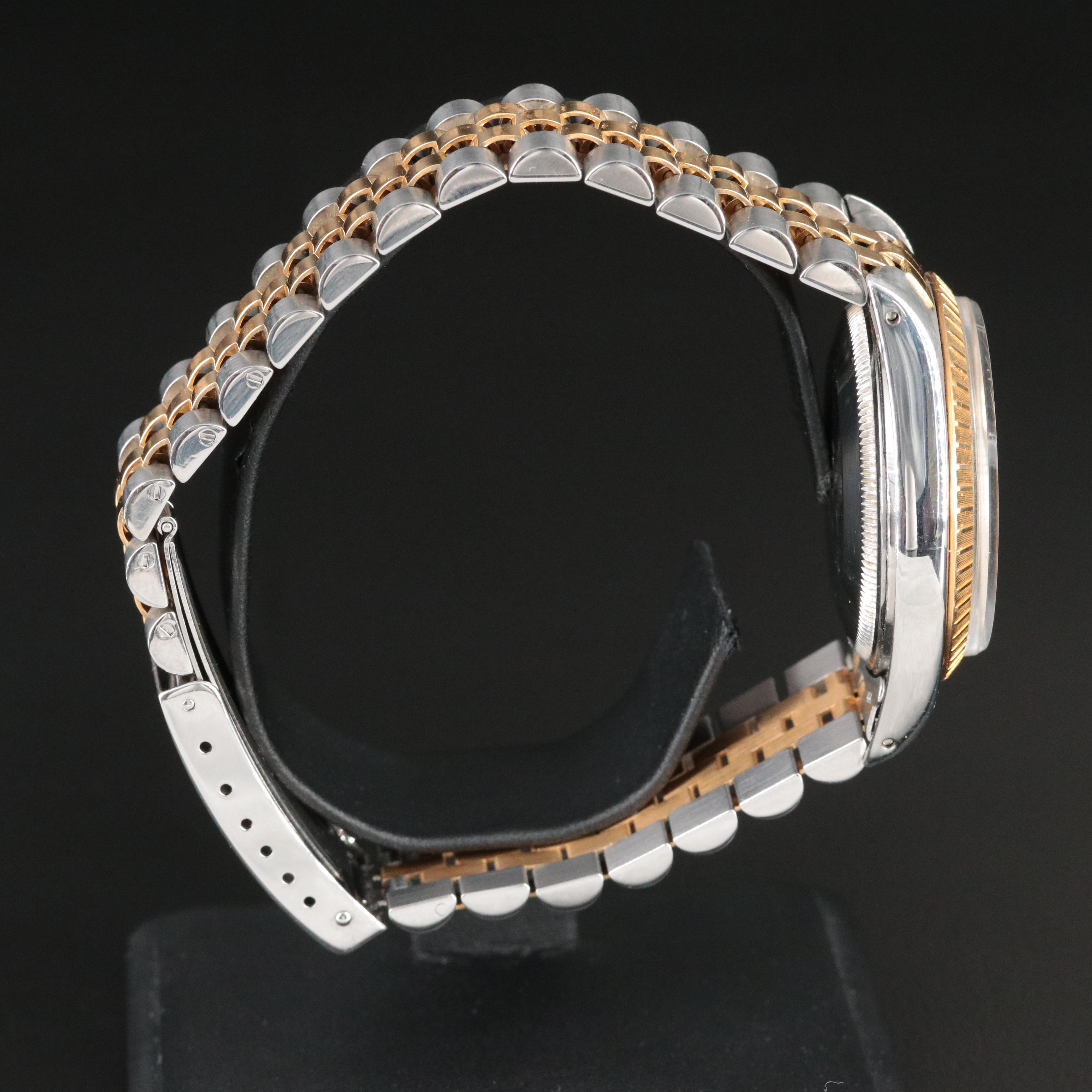 1987-1988 Rolex Oyster Perpetual Date Model 15053 Engine Turned Bezel Watch