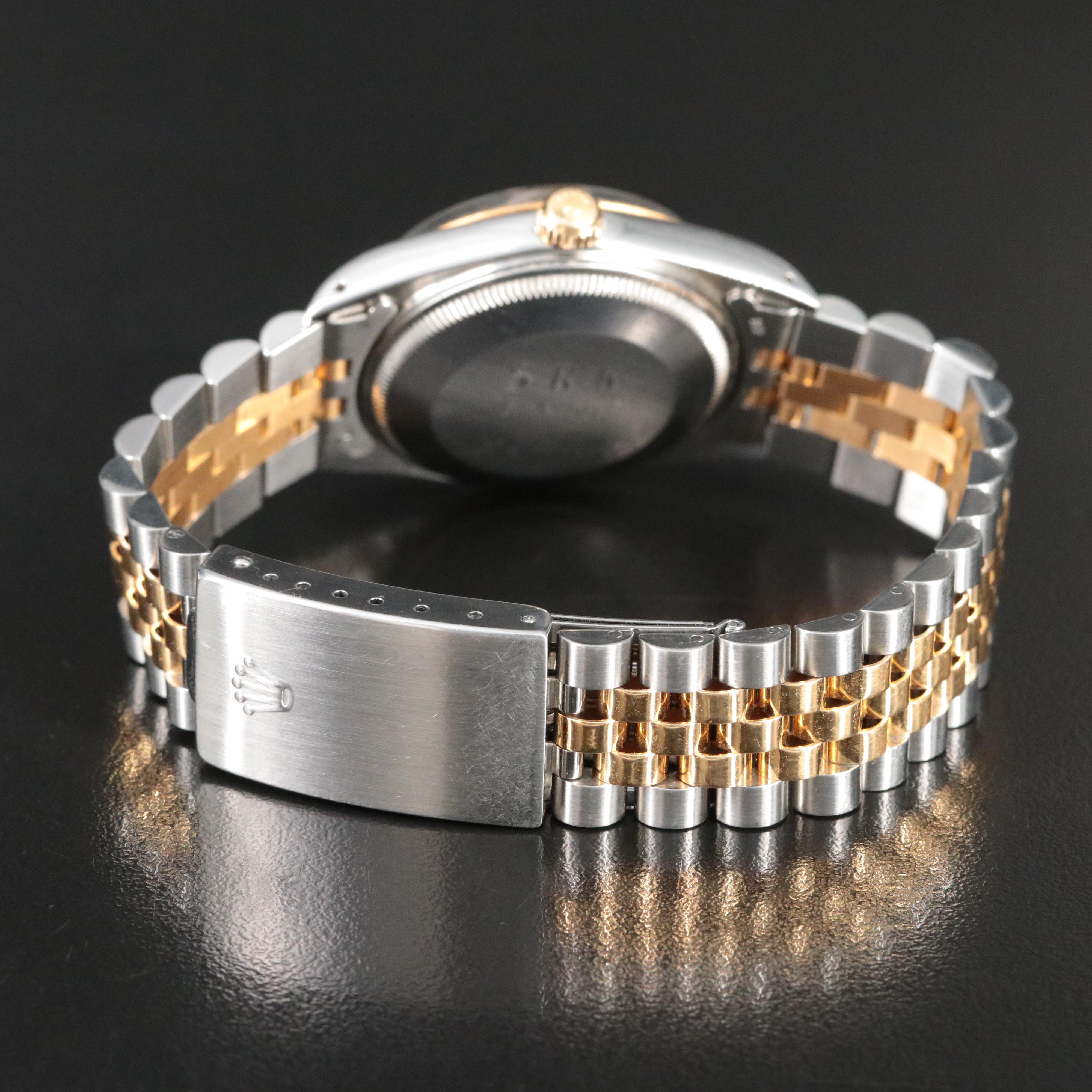 1987-1988 Rolex Oyster Perpetual Date Model 15053 Engine Turned Bezel Watch