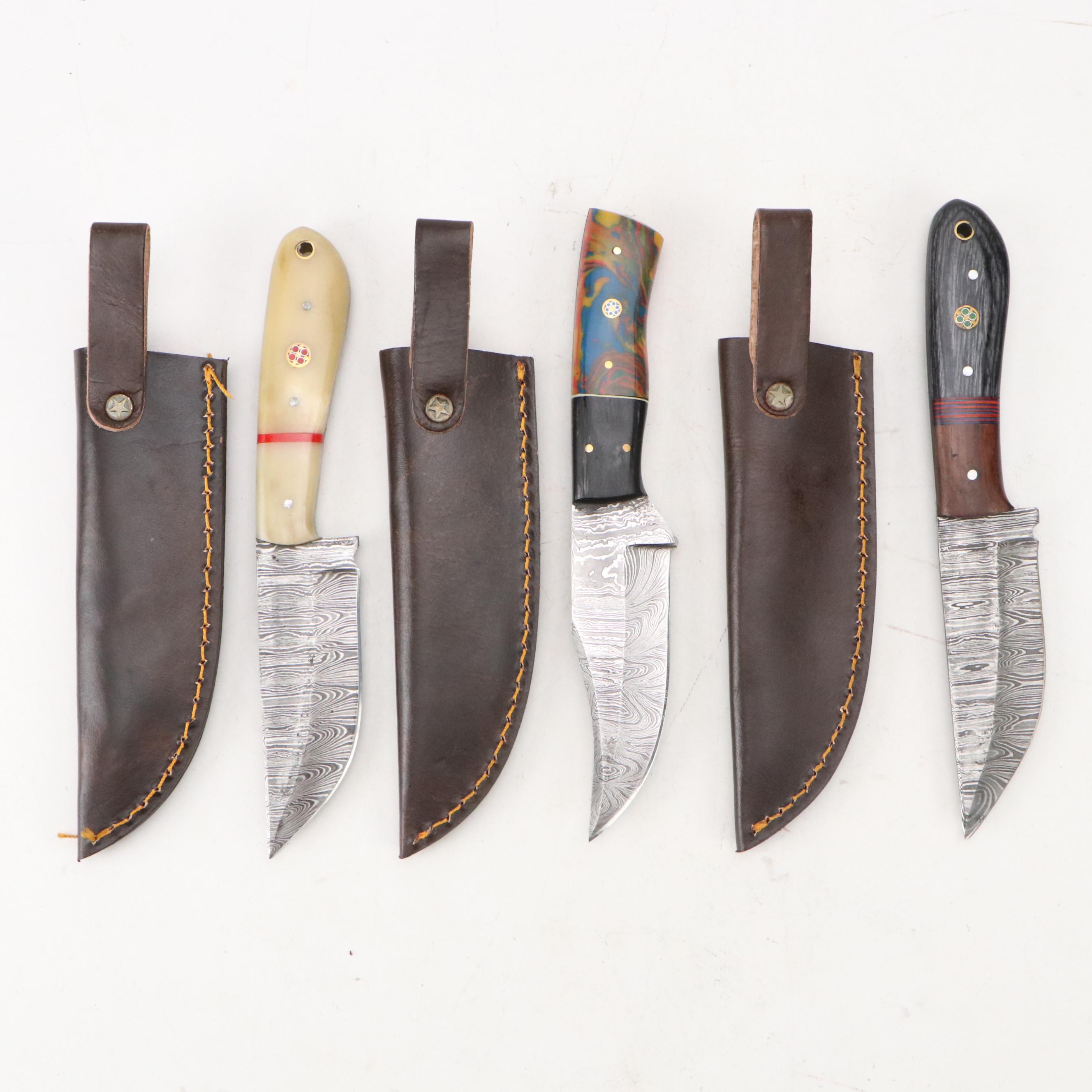 Damascus Steel Hunting and Skinner Knives in Leather Scabbards