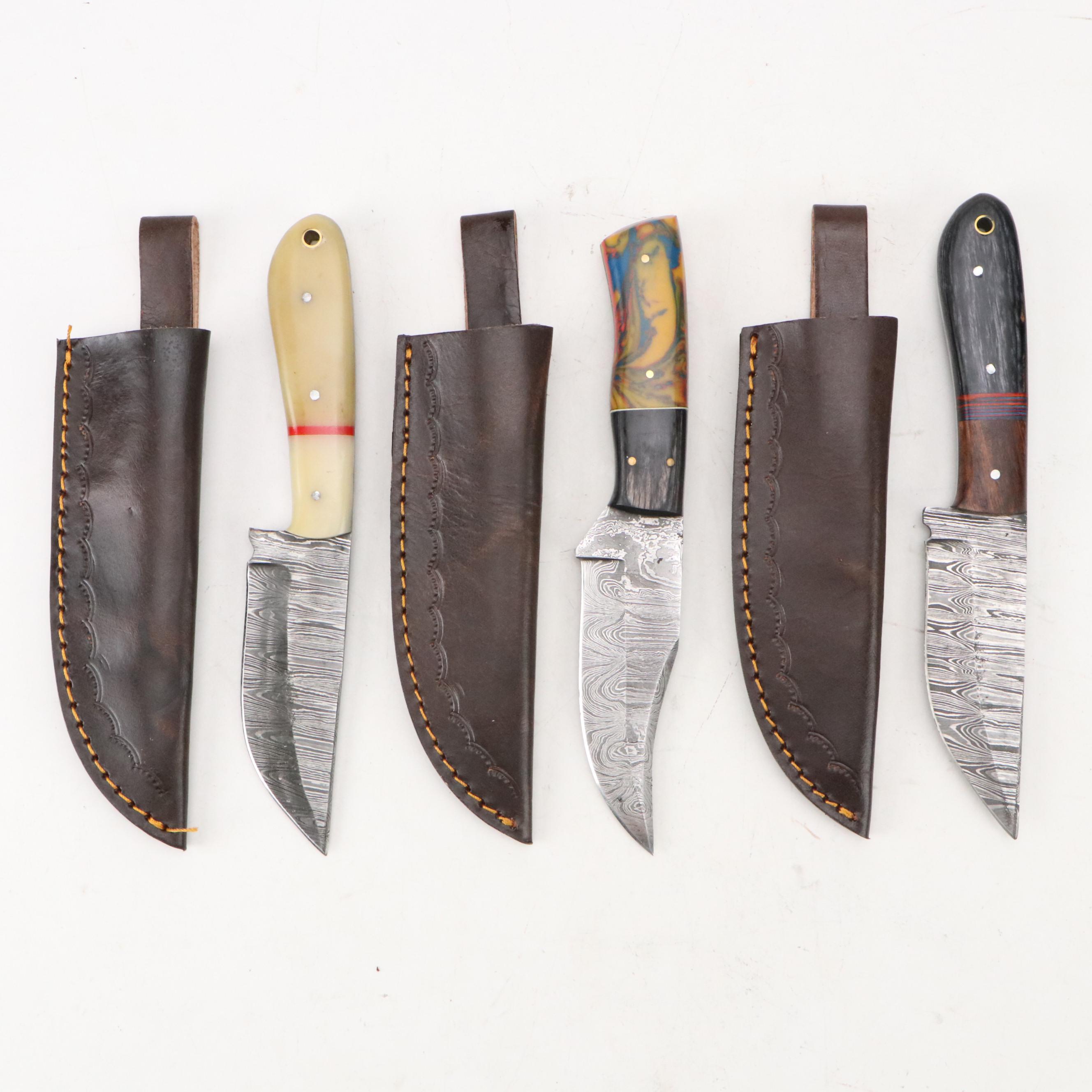 Damascus Steel Hunting and Skinner Knives in Leather Scabbards
