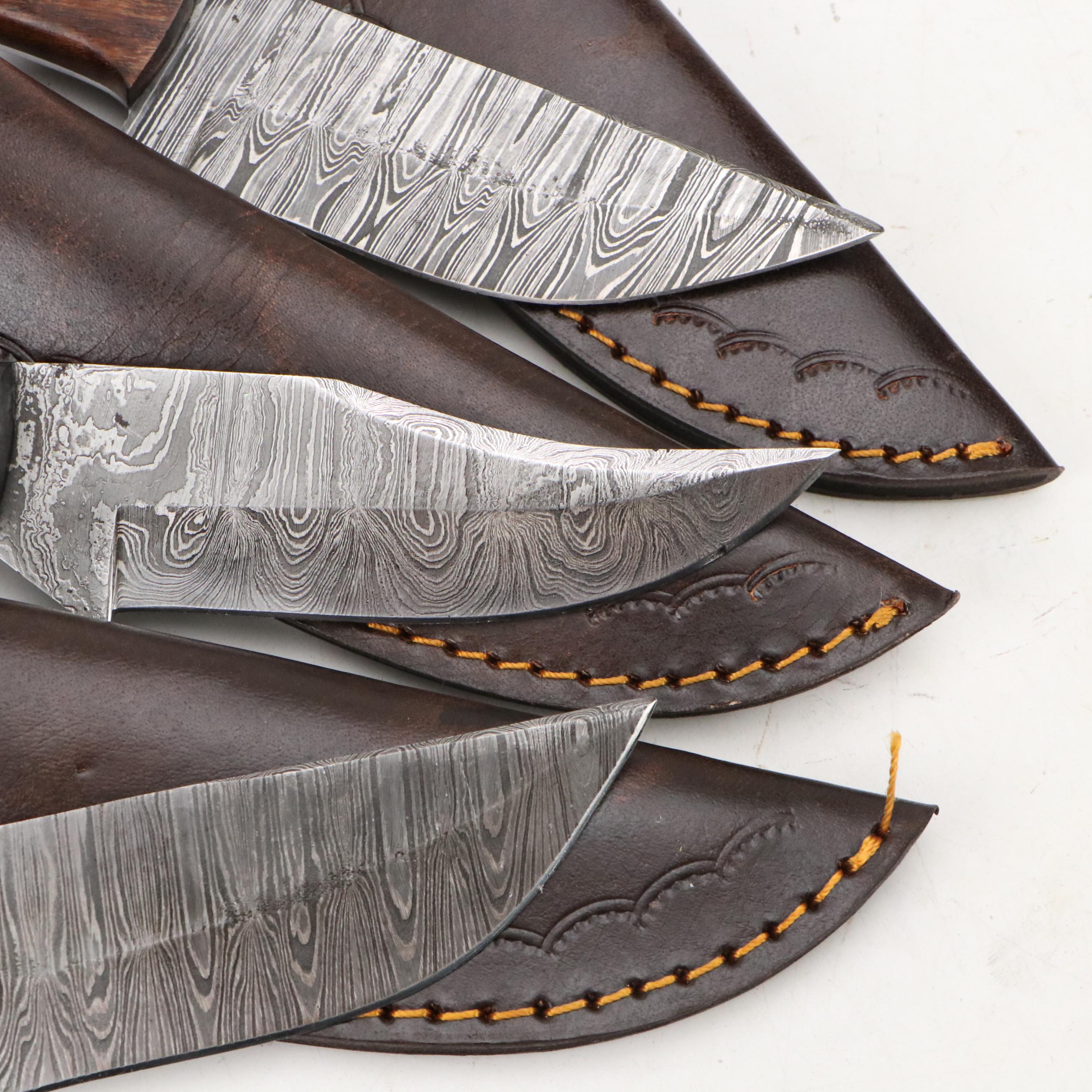 Damascus Steel Hunting and Skinner Knives in Leather Scabbards