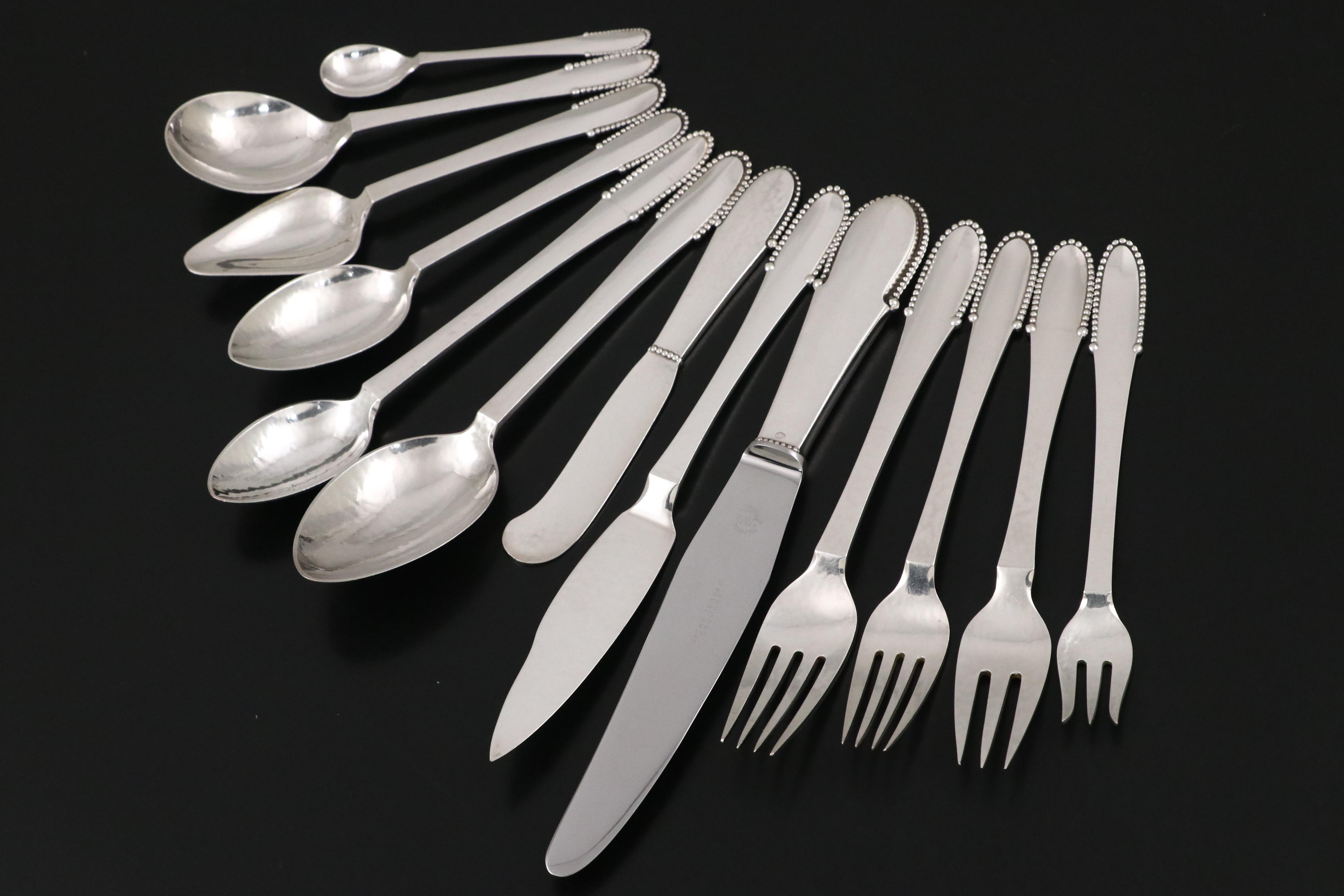 Georg Jensen "Beaded" Hammered Sterling Silver Flatware Service for Twelve
