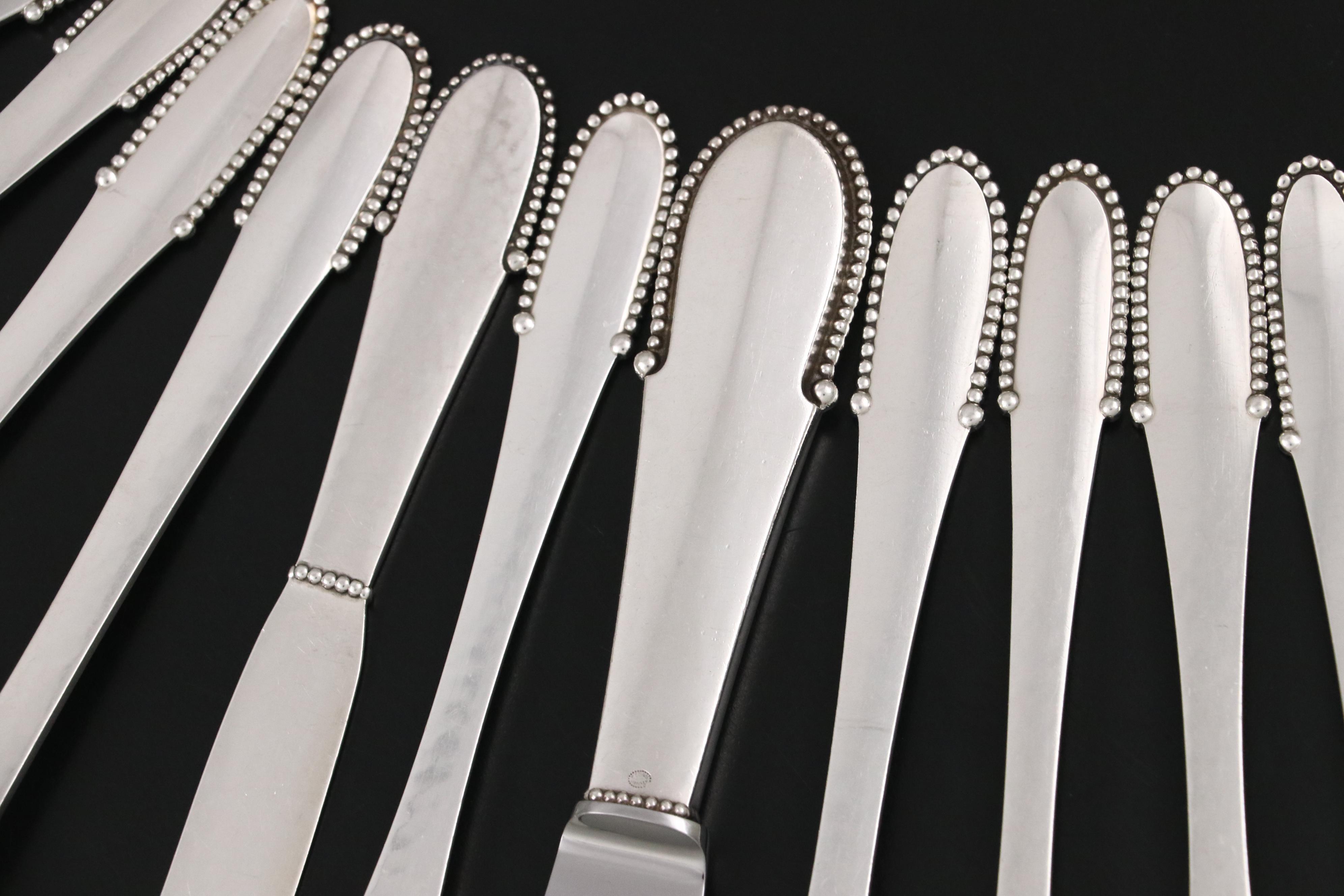Georg Jensen "Beaded" Hammered Sterling Silver Flatware Service for Twelve