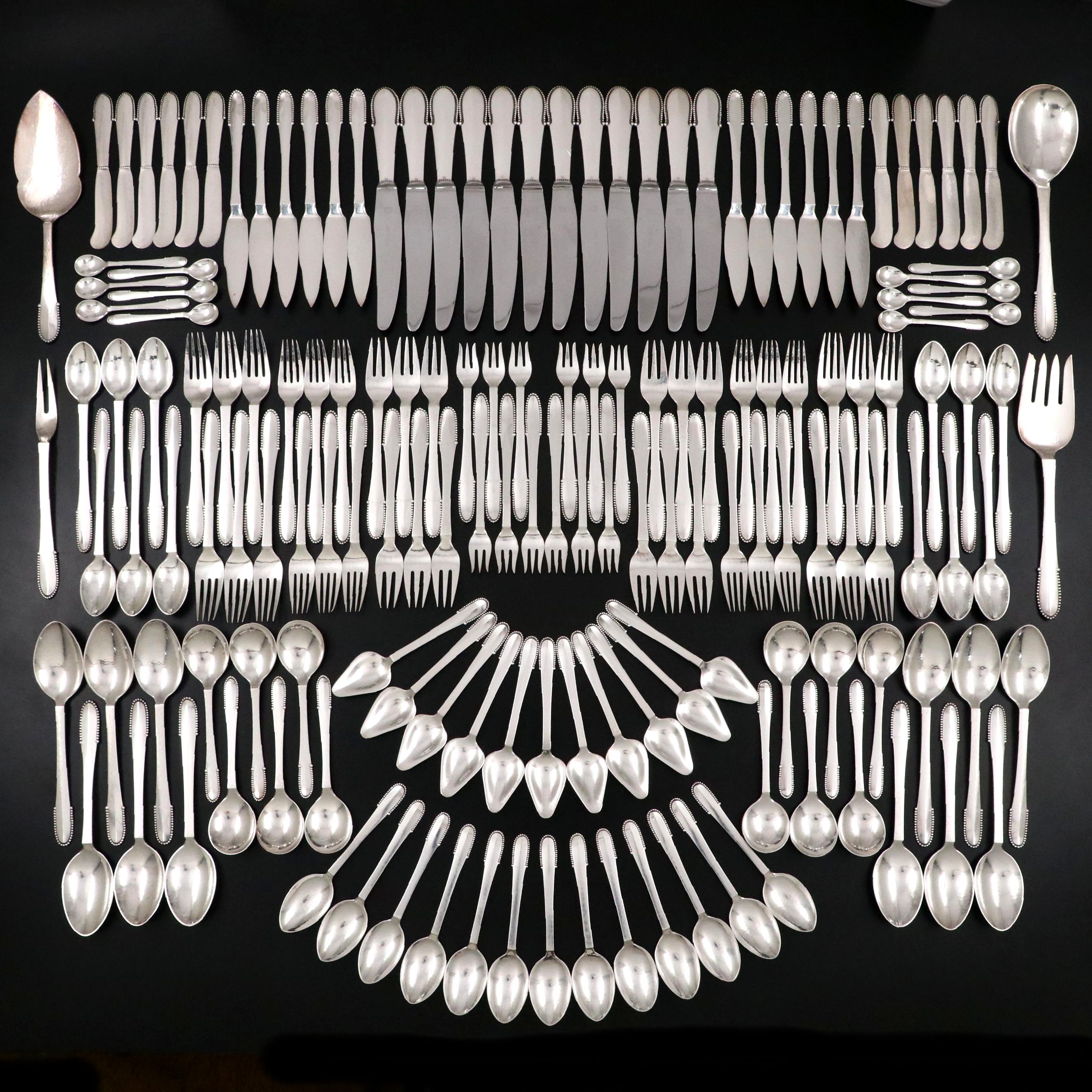 Georg Jensen "Beaded" Hammered Sterling Silver Flatware Service for Twelve