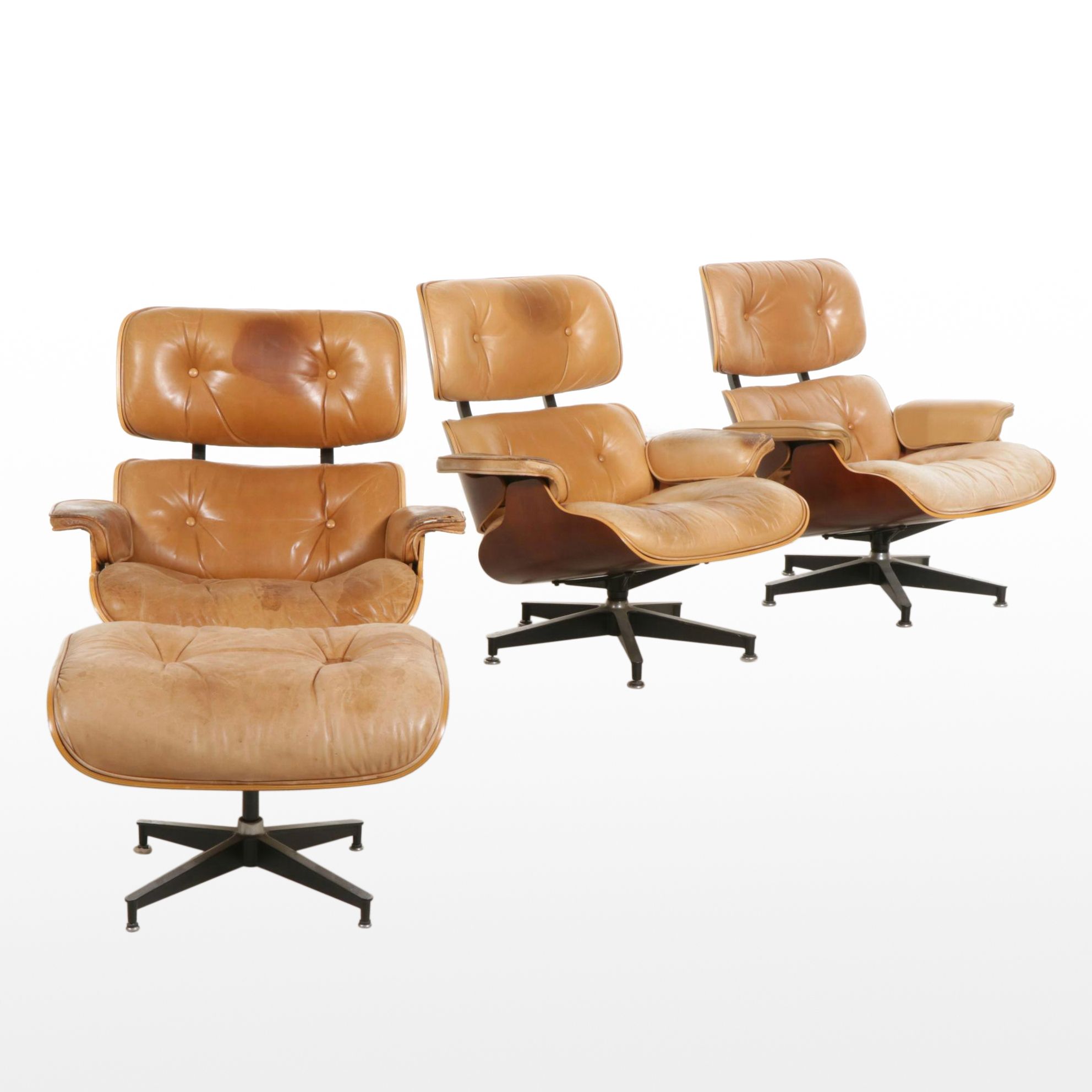 Three Charles and Ray Eames for Herman Miller Wood Lounge Chairs and One Ottoman