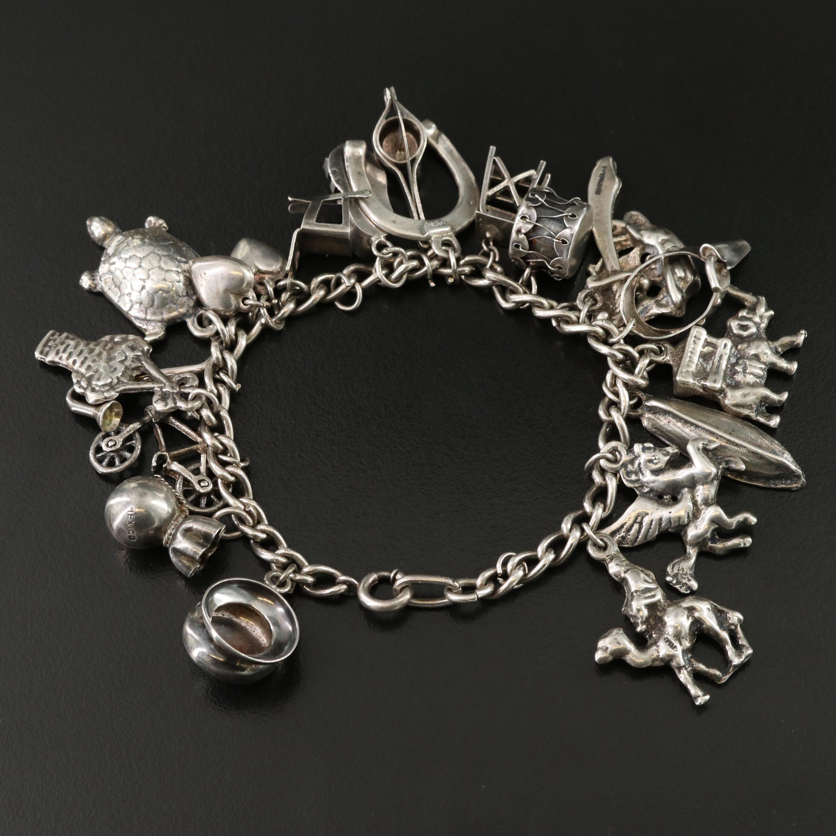 Vintage Charm Bracelet Featuring Sterling, Articulated and Mexican Charms