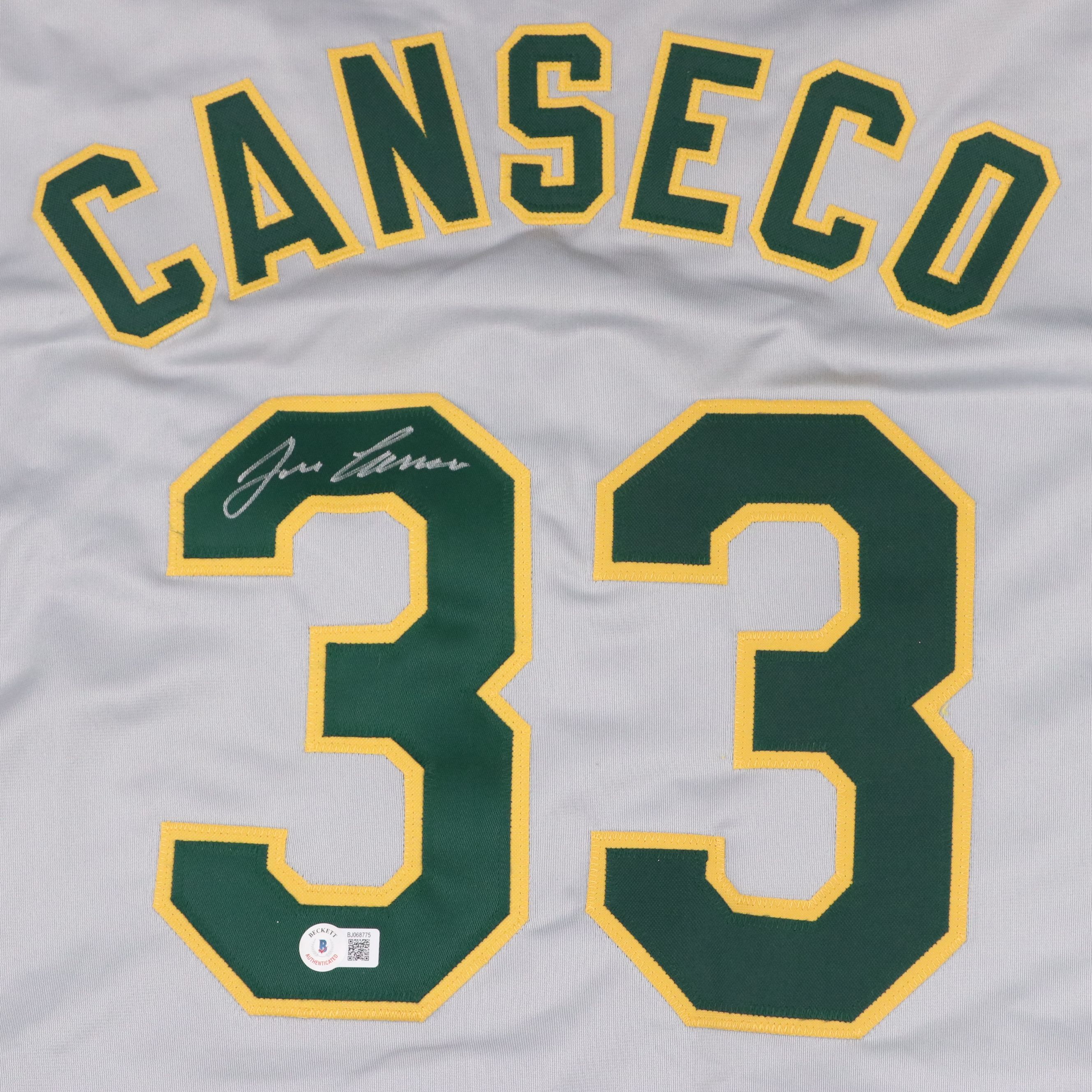 Jose Canseco Signed Oakland Athletics Jersey with Roger Clemens Signed Baseball