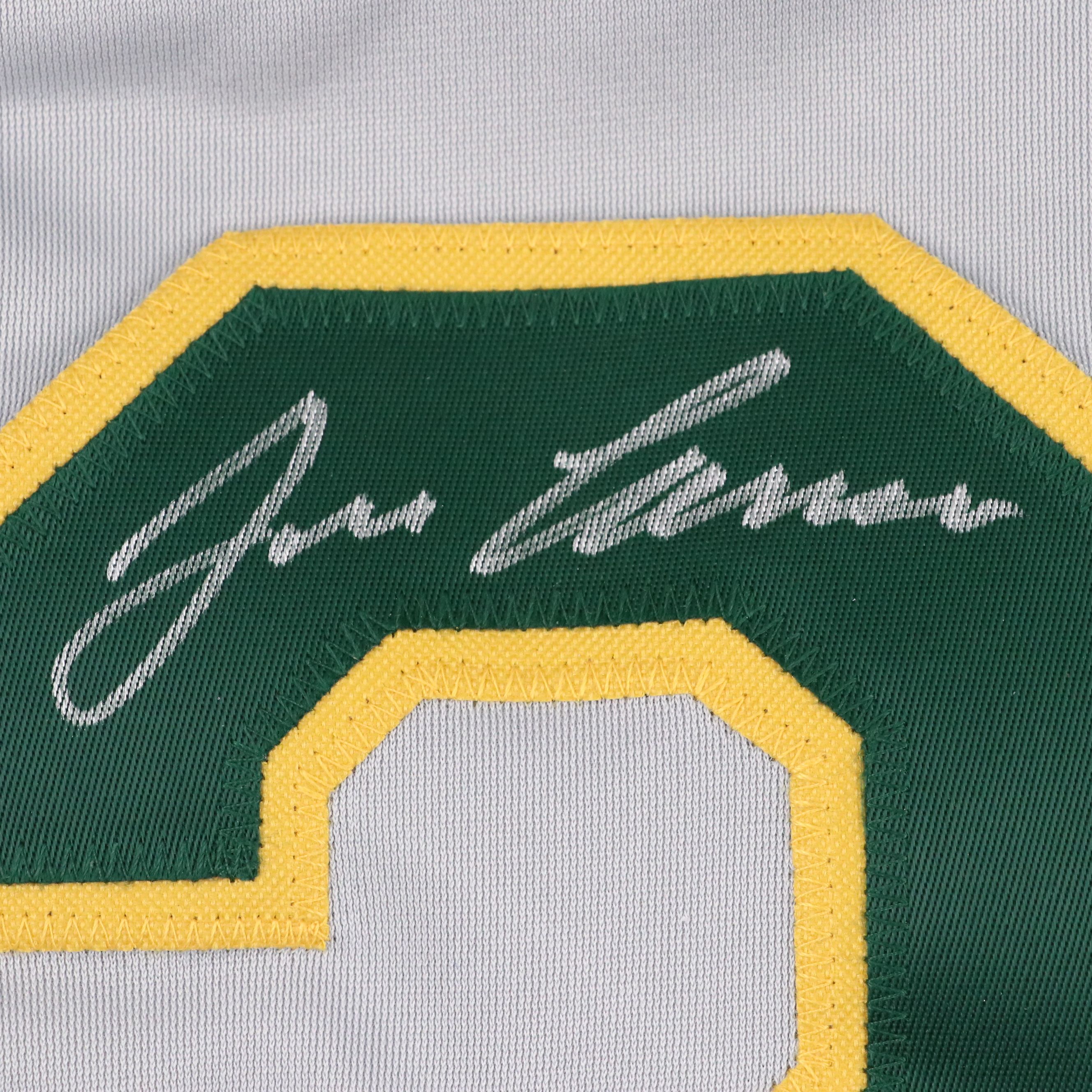 Jose Canseco Signed Oakland Athletics Jersey with Roger Clemens Signed Baseball