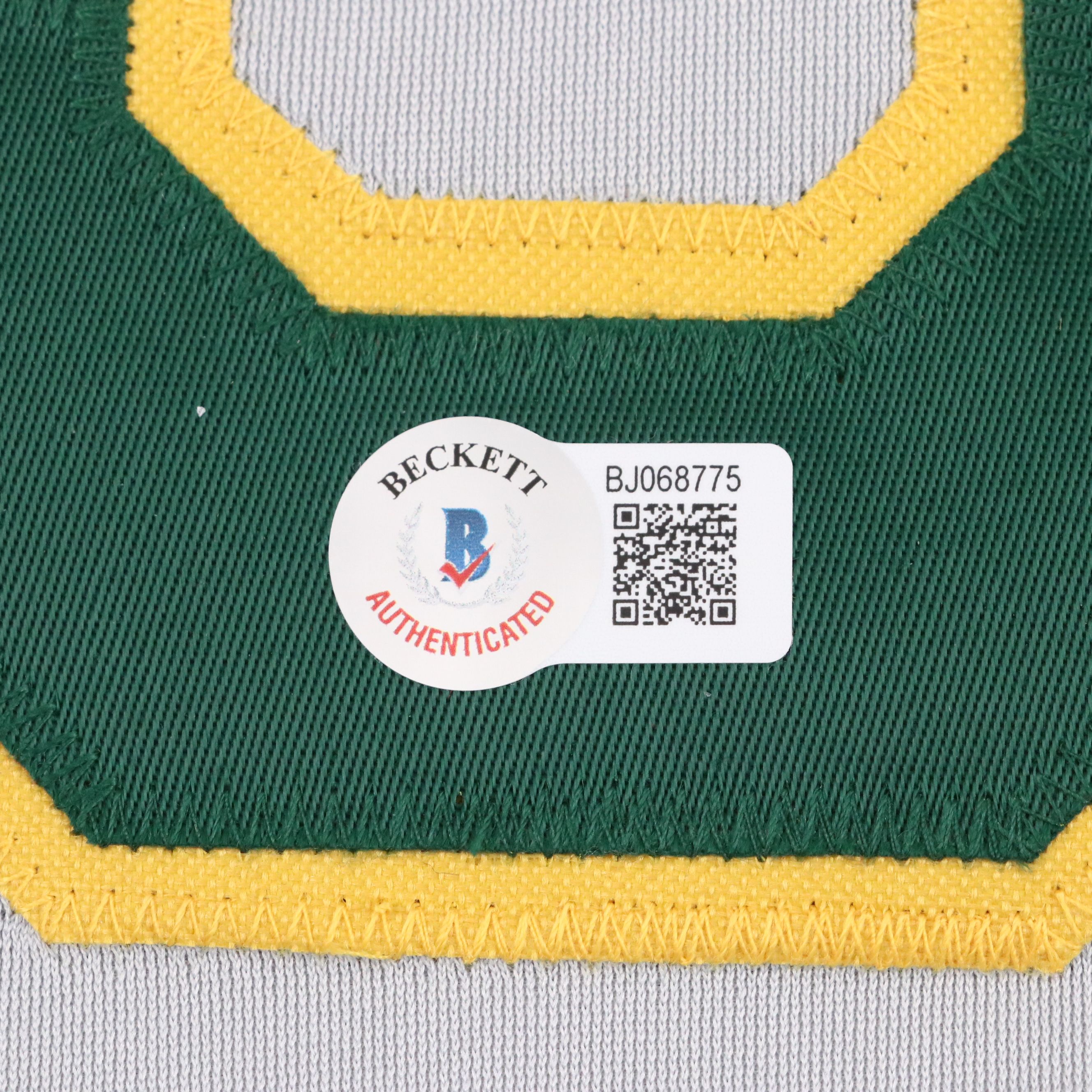 Jose Canseco Signed Oakland Athletics Jersey with Roger Clemens Signed Baseball