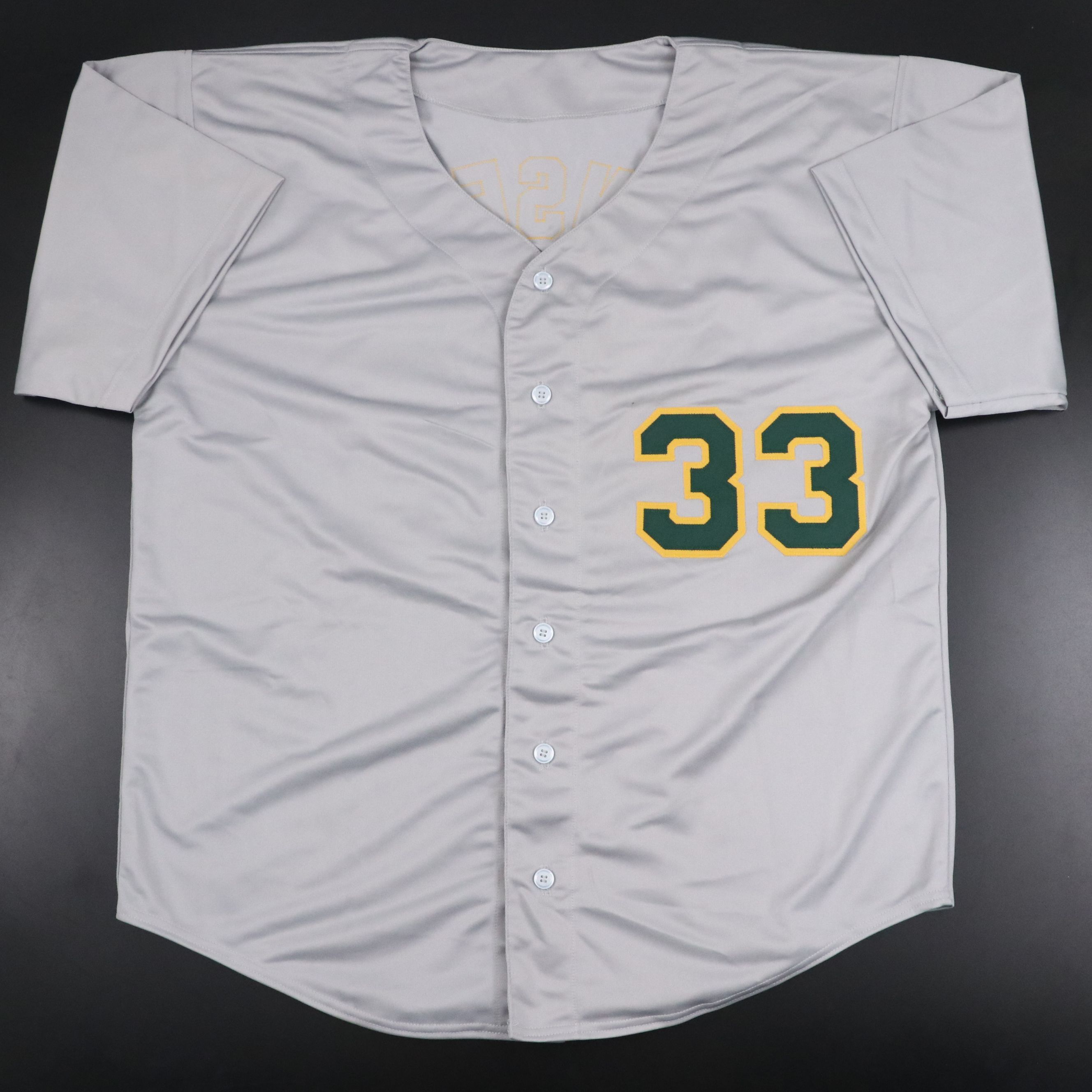 Jose Canseco Signed Oakland Athletics Jersey with Roger Clemens Signed Baseball
