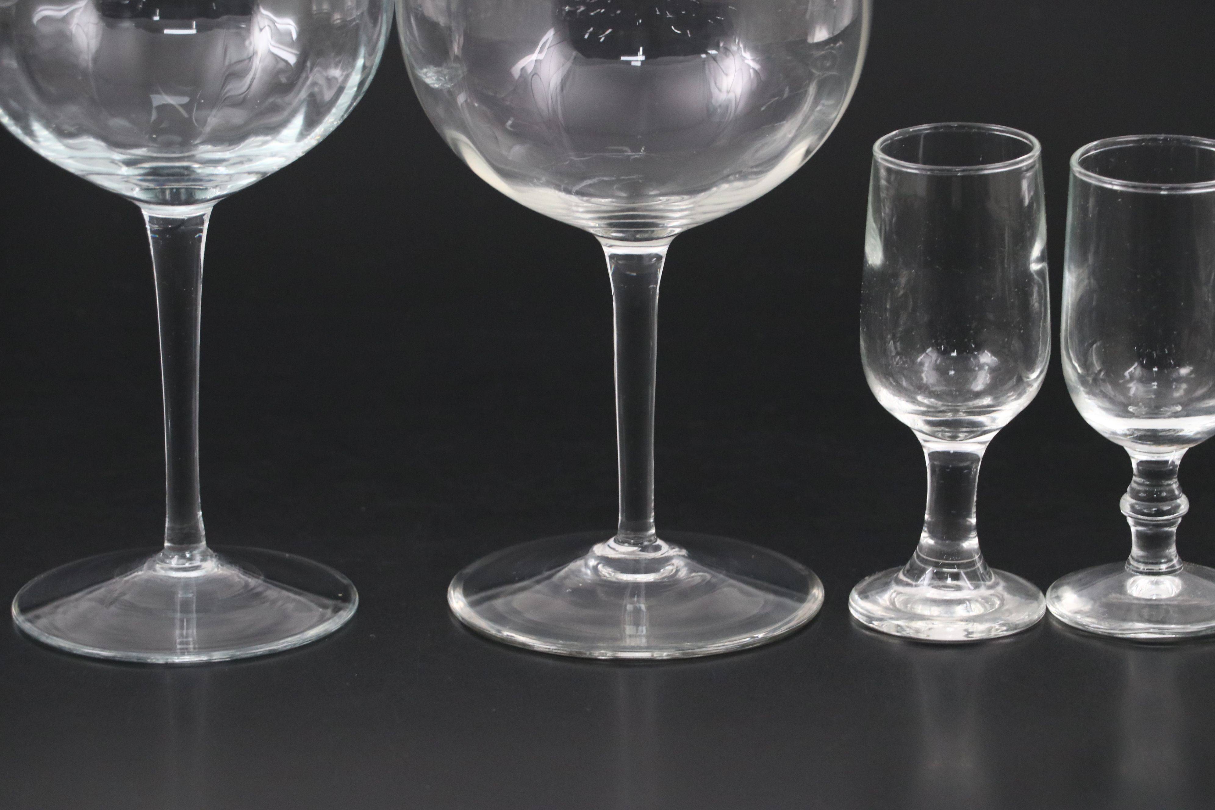 Glass Swirl and Flat Sphere Wine Glasses with Glass Bubble Stem Shot Glasses
