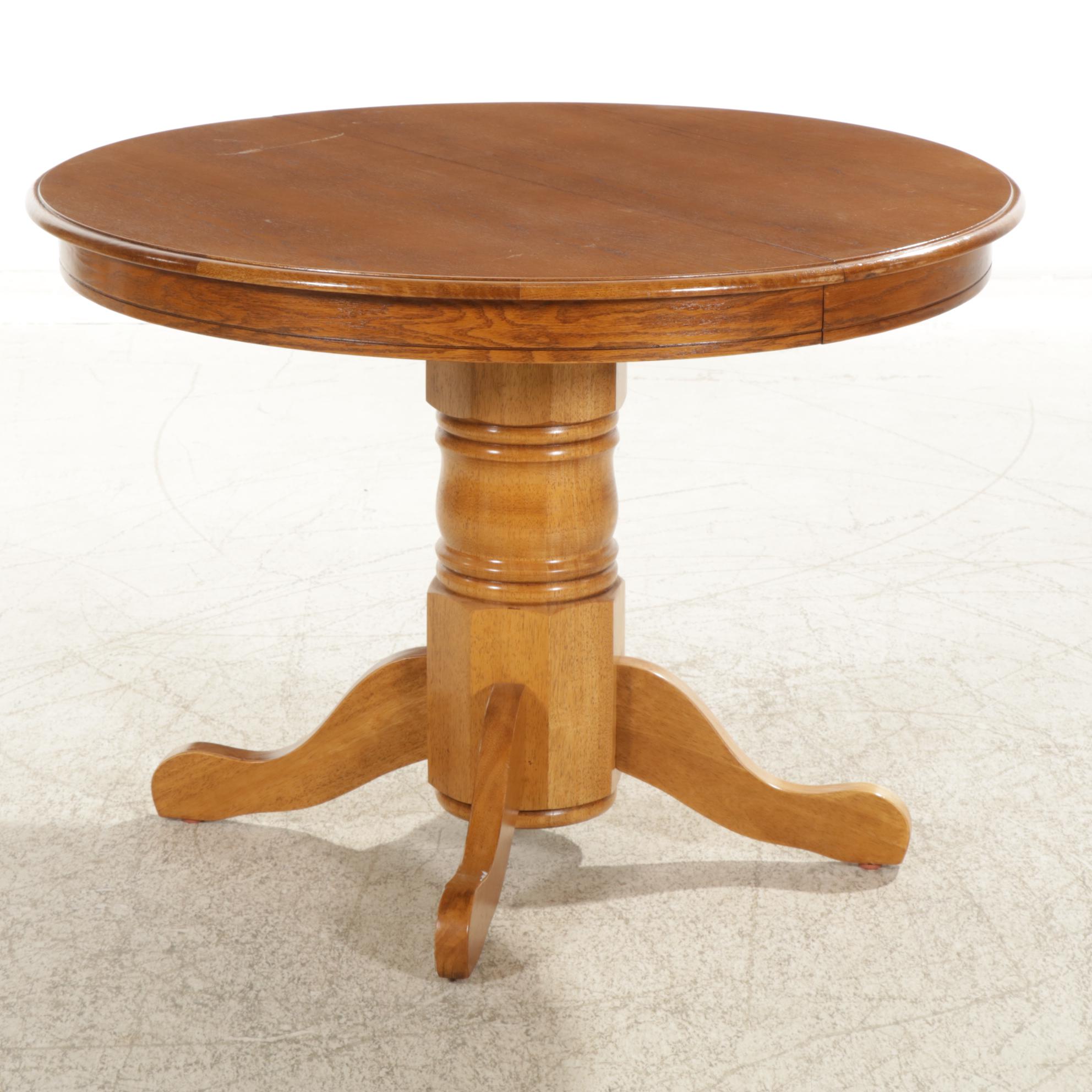 Oak Pedestal Dining Table and Four Arrow Back Chairs