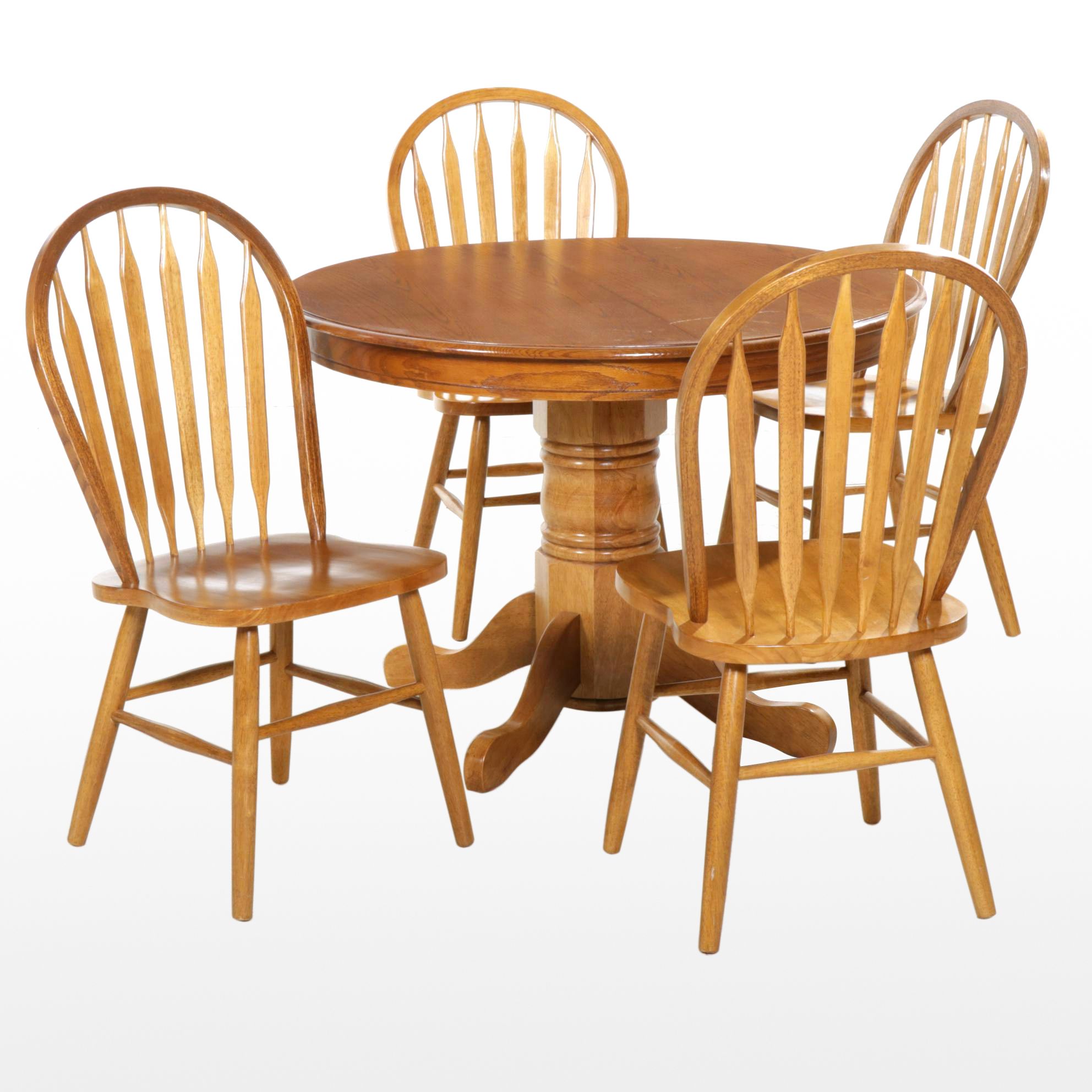 Oak Pedestal Dining Table and Four Arrow Back Chairs