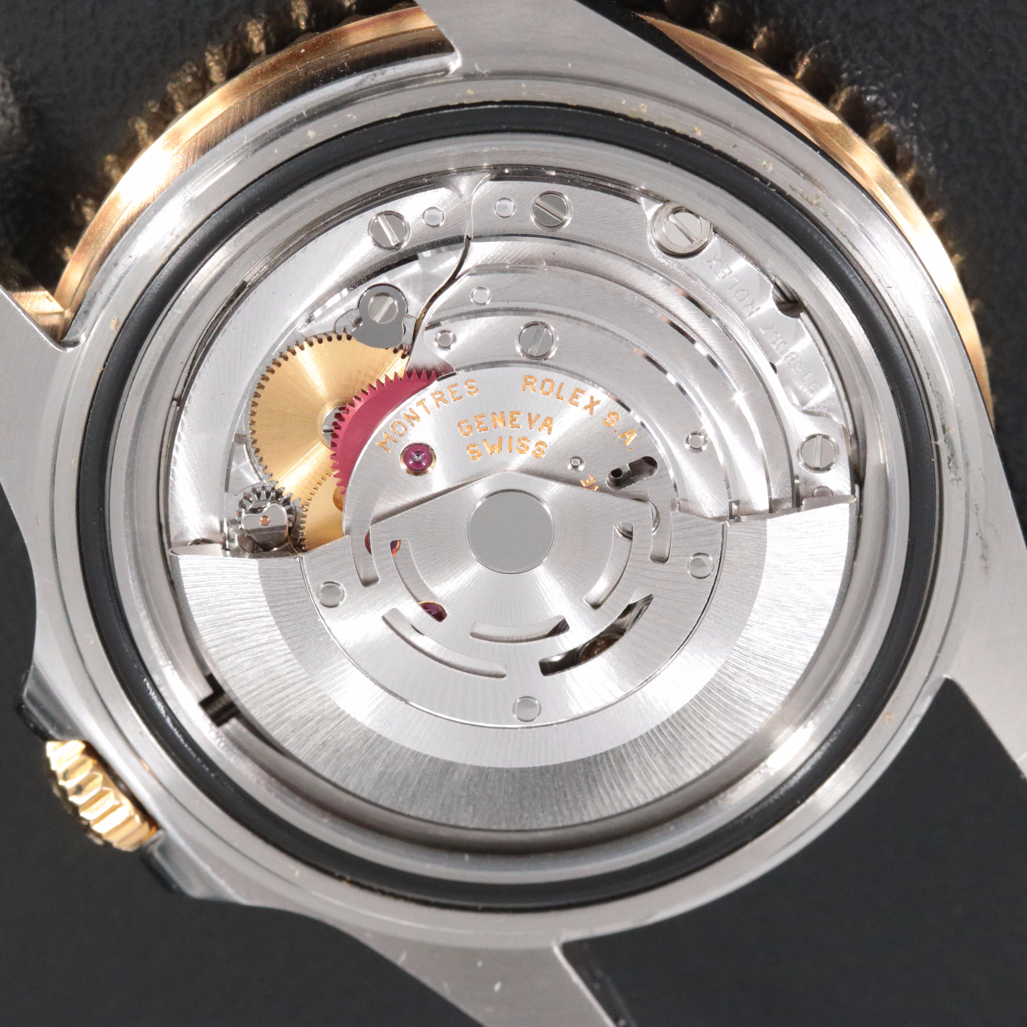 Rolex GMT-Master II 16713 Black 40mm 18k & Steel Automatic Watch circa 2000