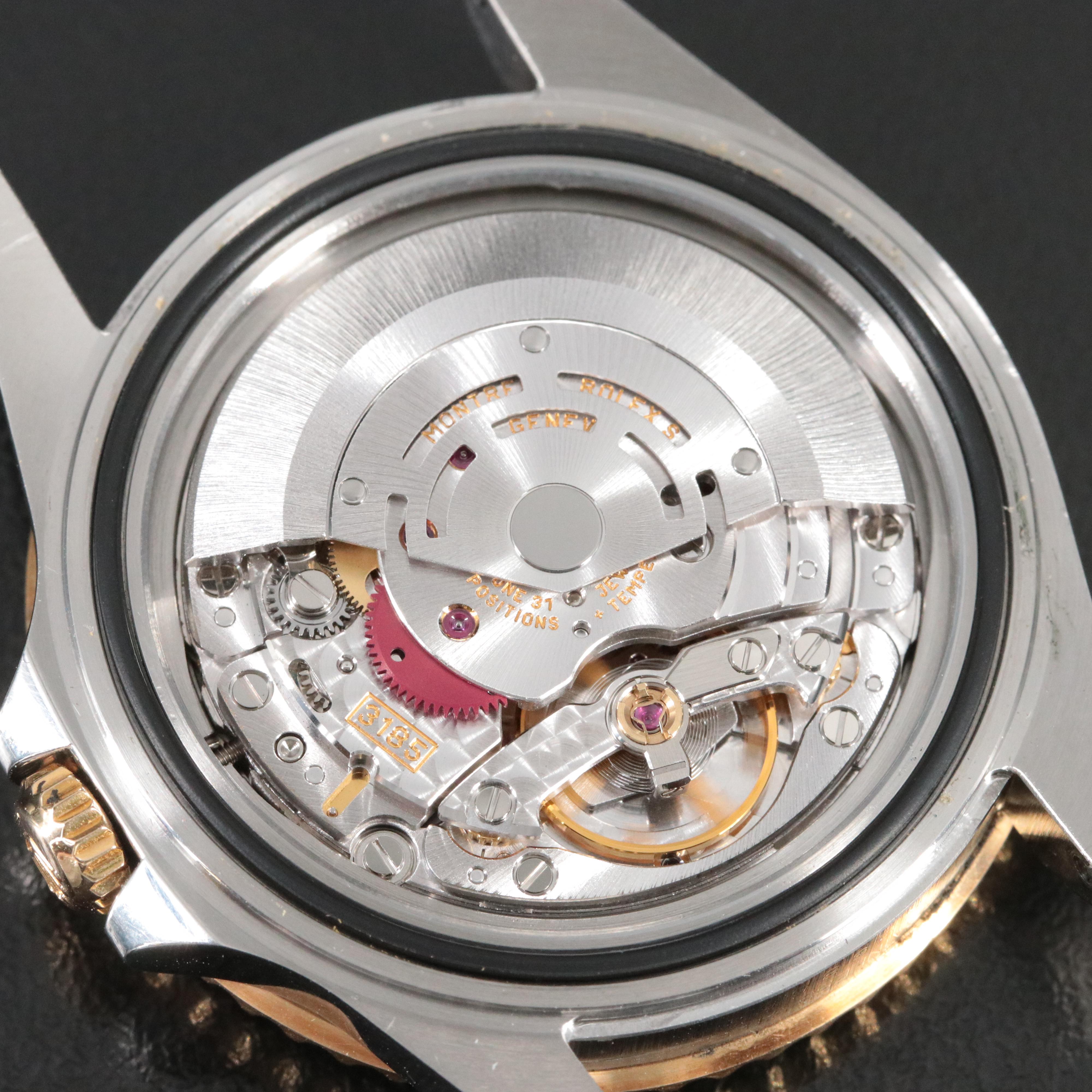 Rolex GMT-Master II 16713 Black 40mm 18k & Steel Automatic Watch circa 2000