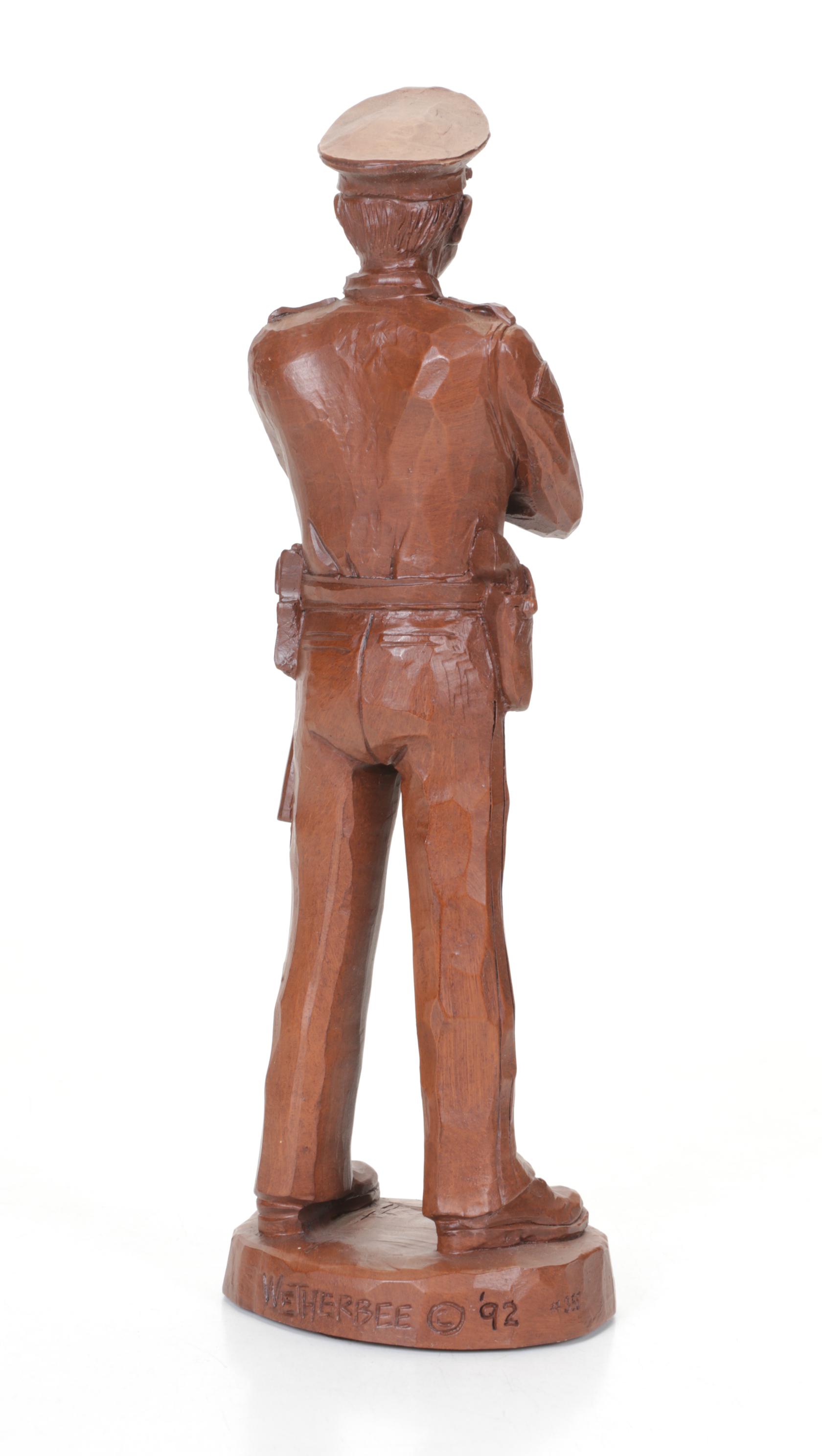 Police Officer & Nude Male Sculptures