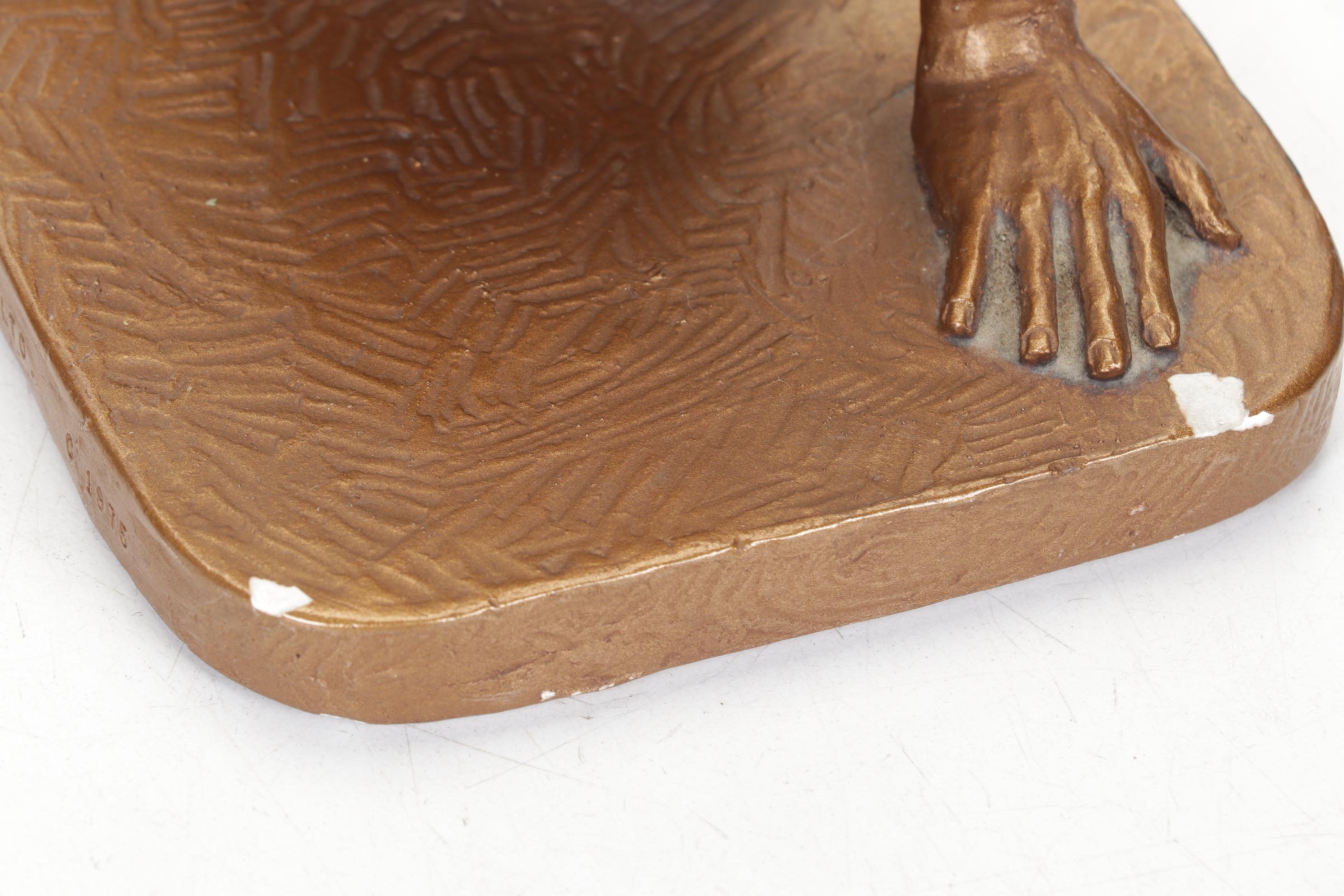 Police Officer & Nude Male Sculptures