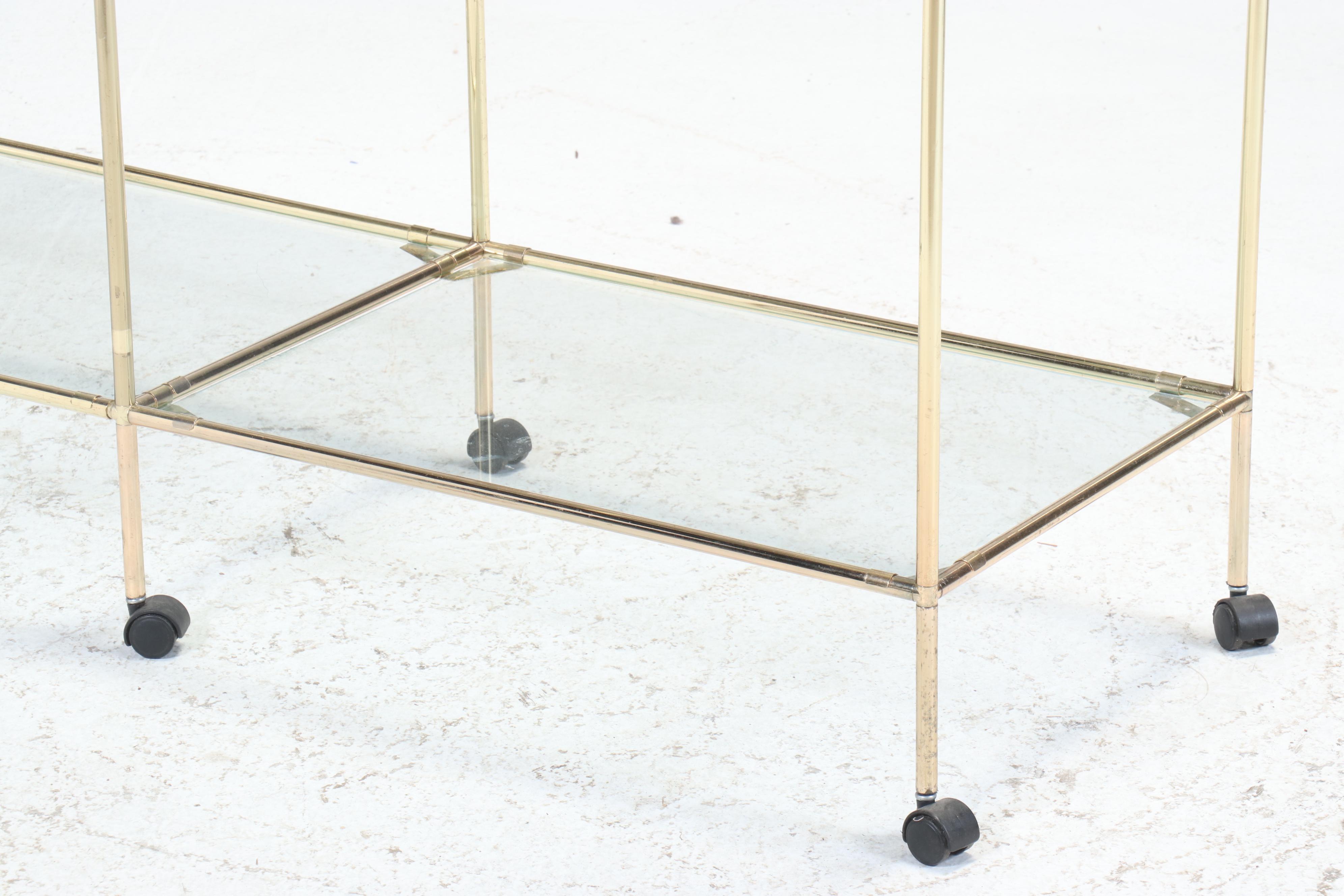 Modern Brass Toned Shelving Unit with Glass Shelves