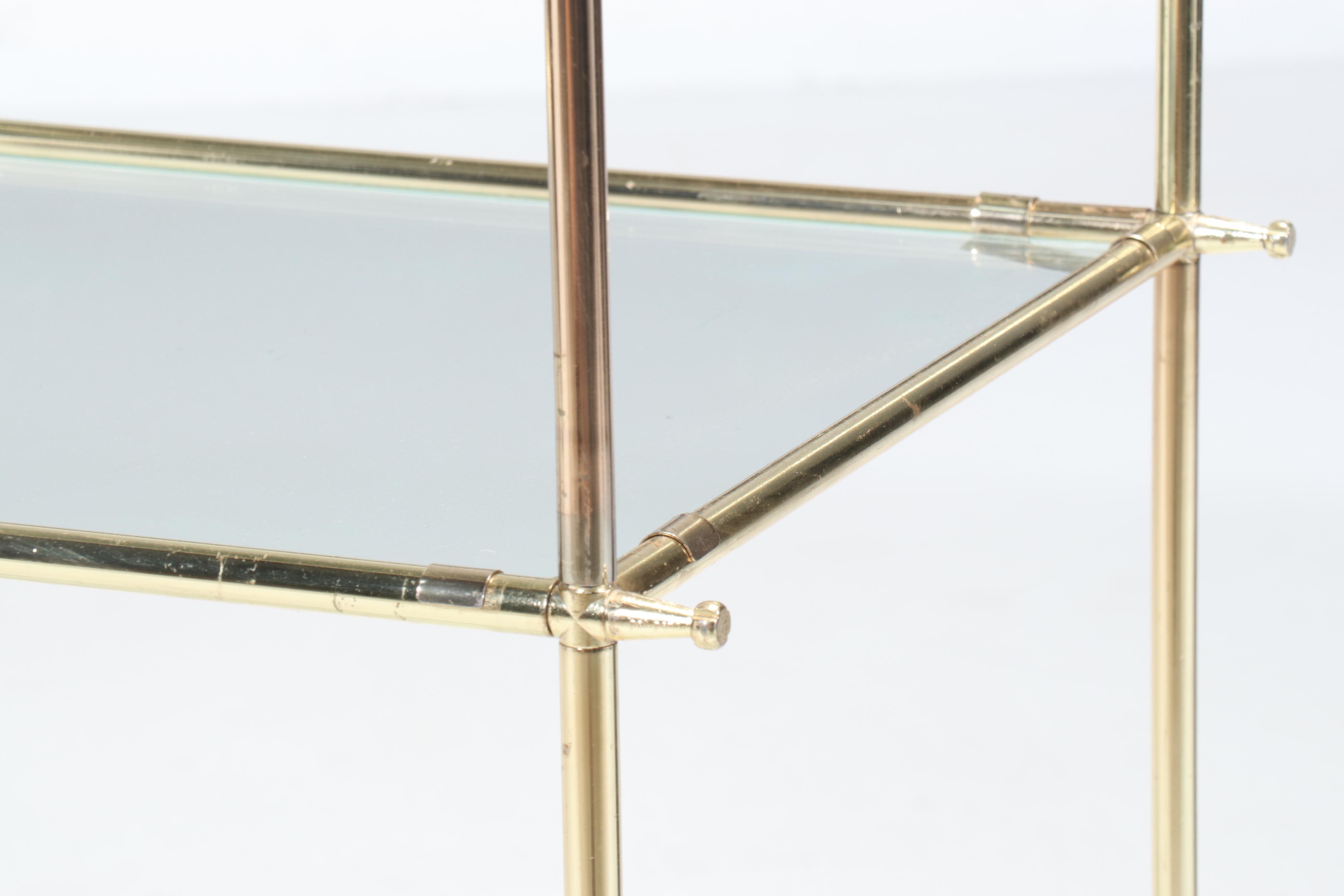 Modern Brass Toned Shelving Unit with Glass Shelves