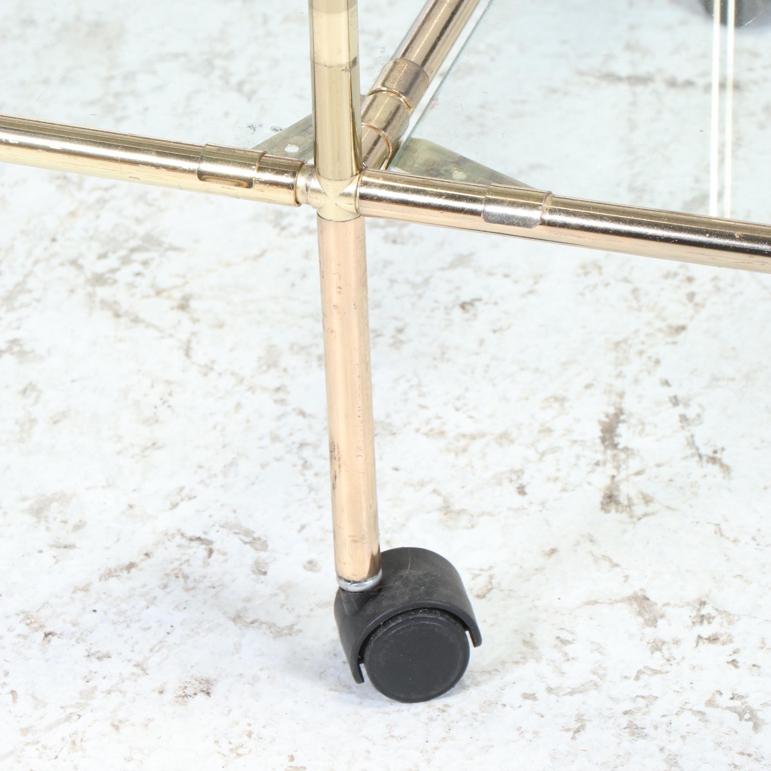 Modern Brass Toned Shelving Unit with Glass Shelves