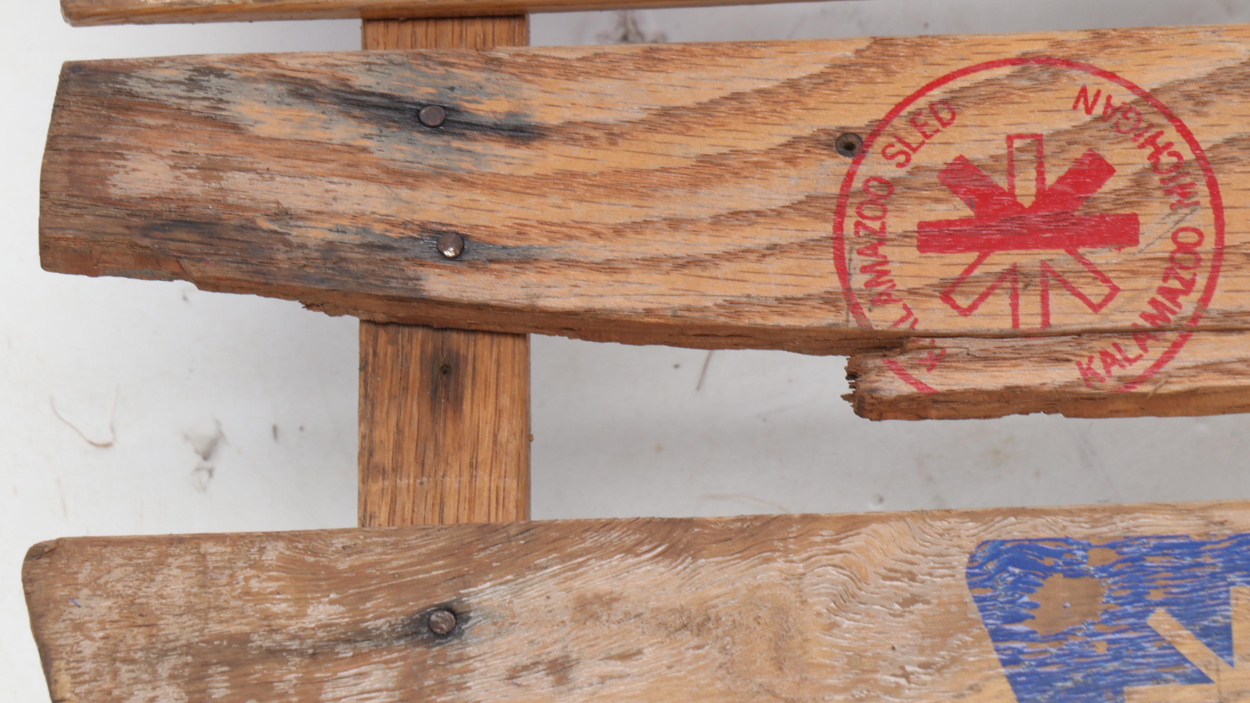 Royal Racer, Kalamazoo Champion F-50 and True Temper Sno Surfer Runner Sleds