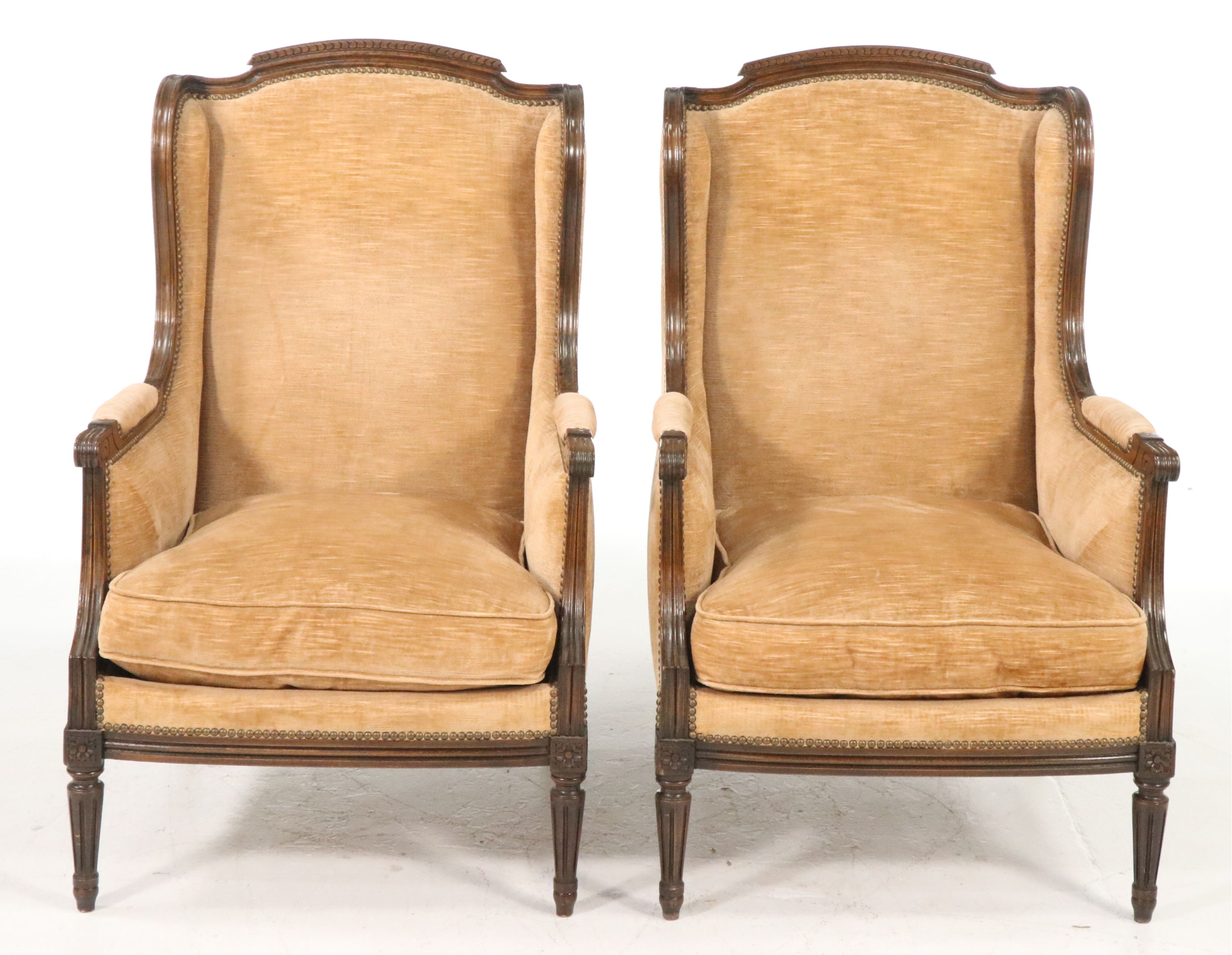 Pair of French Louis XVI Style Carved Wood and Upholstered Bergère Chairs