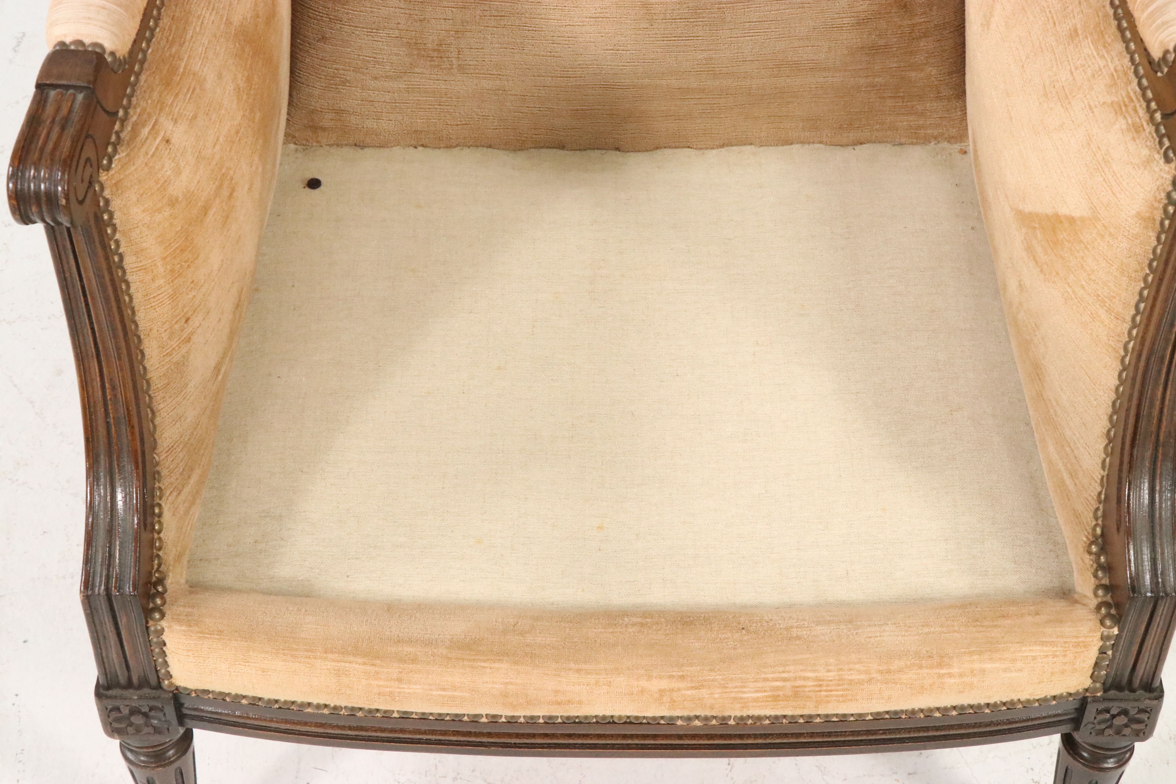 Pair of French Louis XVI Style Carved Wood and Upholstered Bergère Chairs