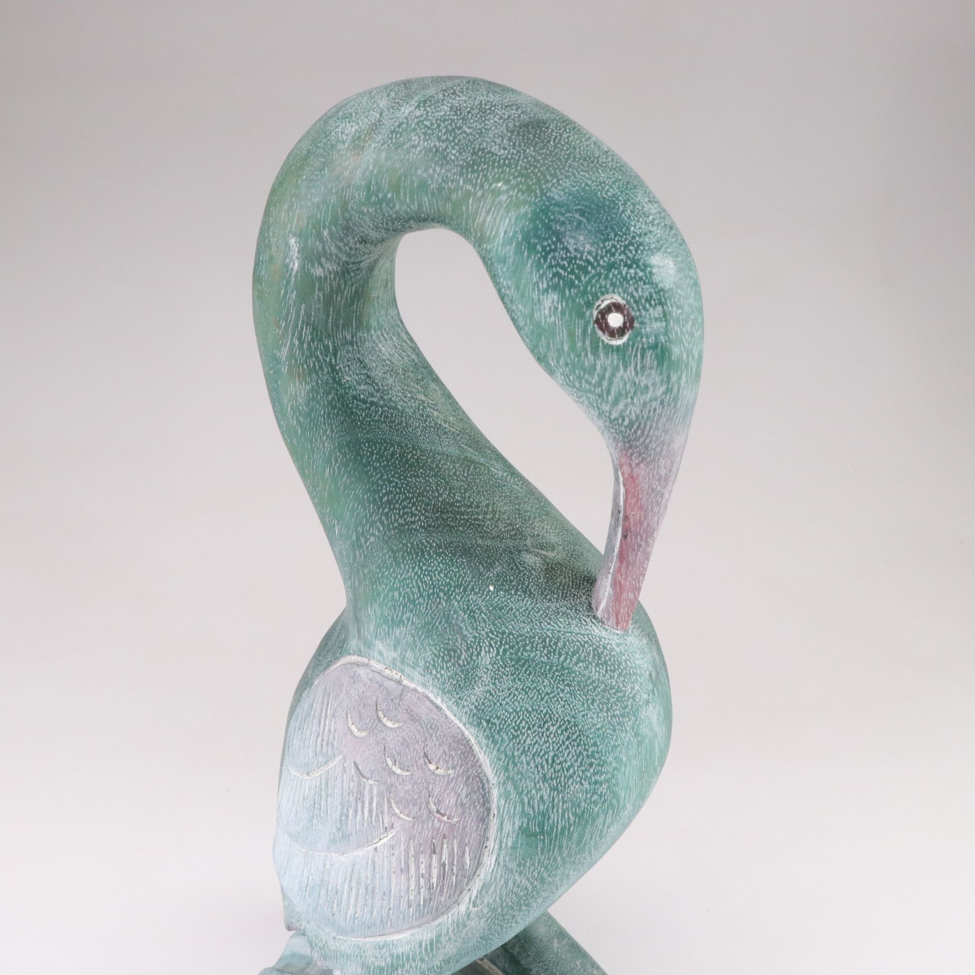 Hand-Carved Wooden Blue Heron Figure in Teal and Pink Hues