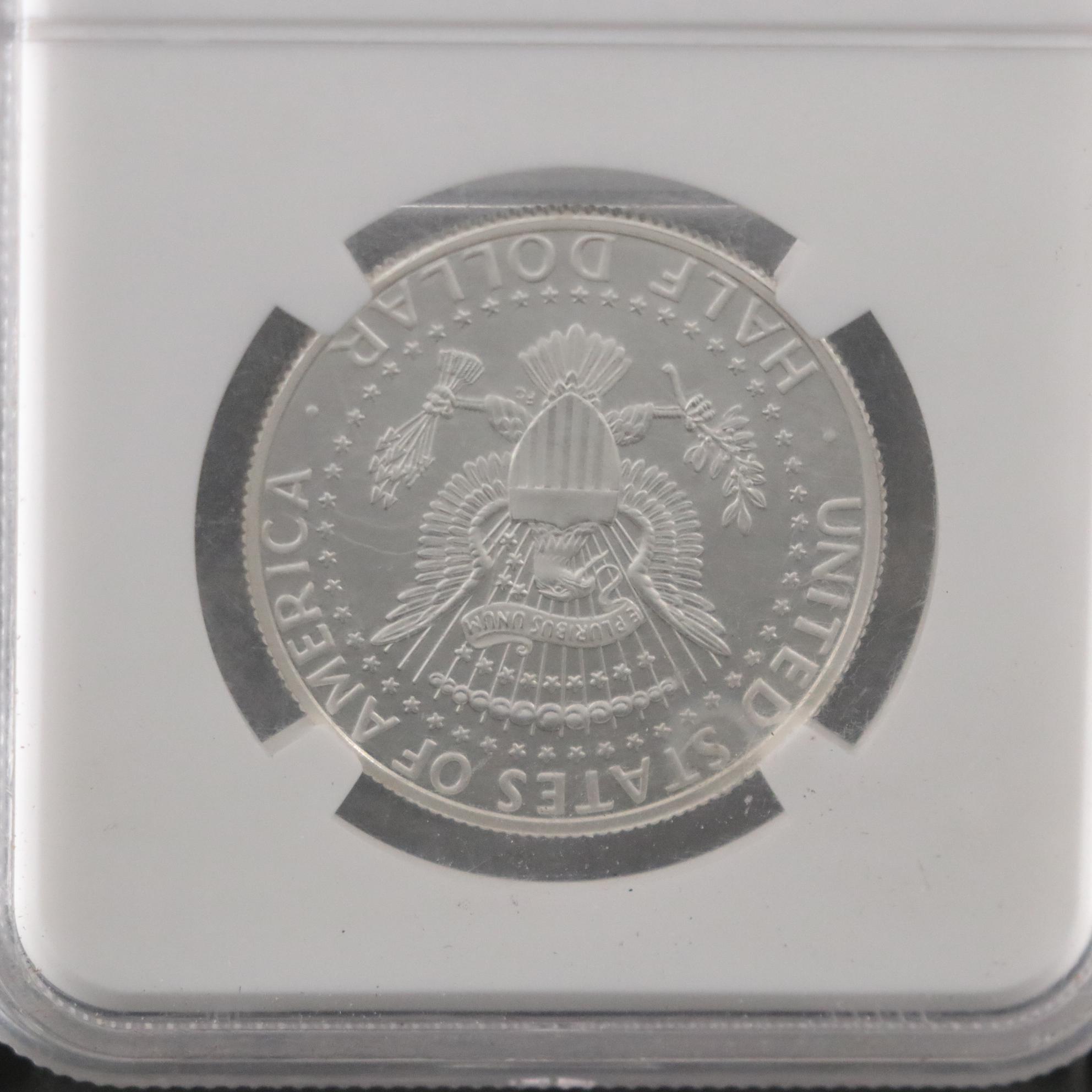NGC SP70 Enhanced and SP 67 2014 Clad Kennedy Half Dollars