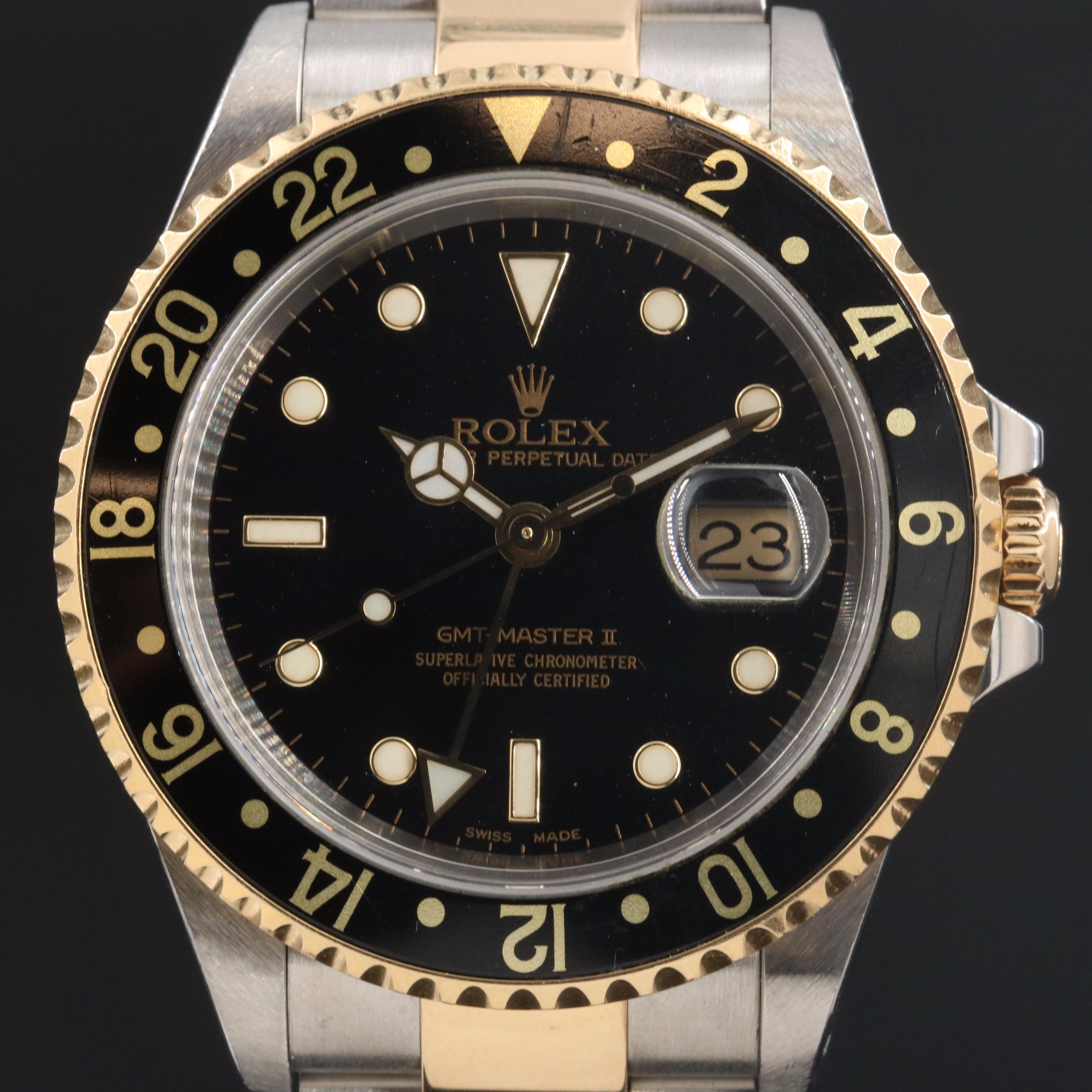 Rolex GMT-Master II 16713 Black 40mm 18k & Steel Automatic Watch circa 2000