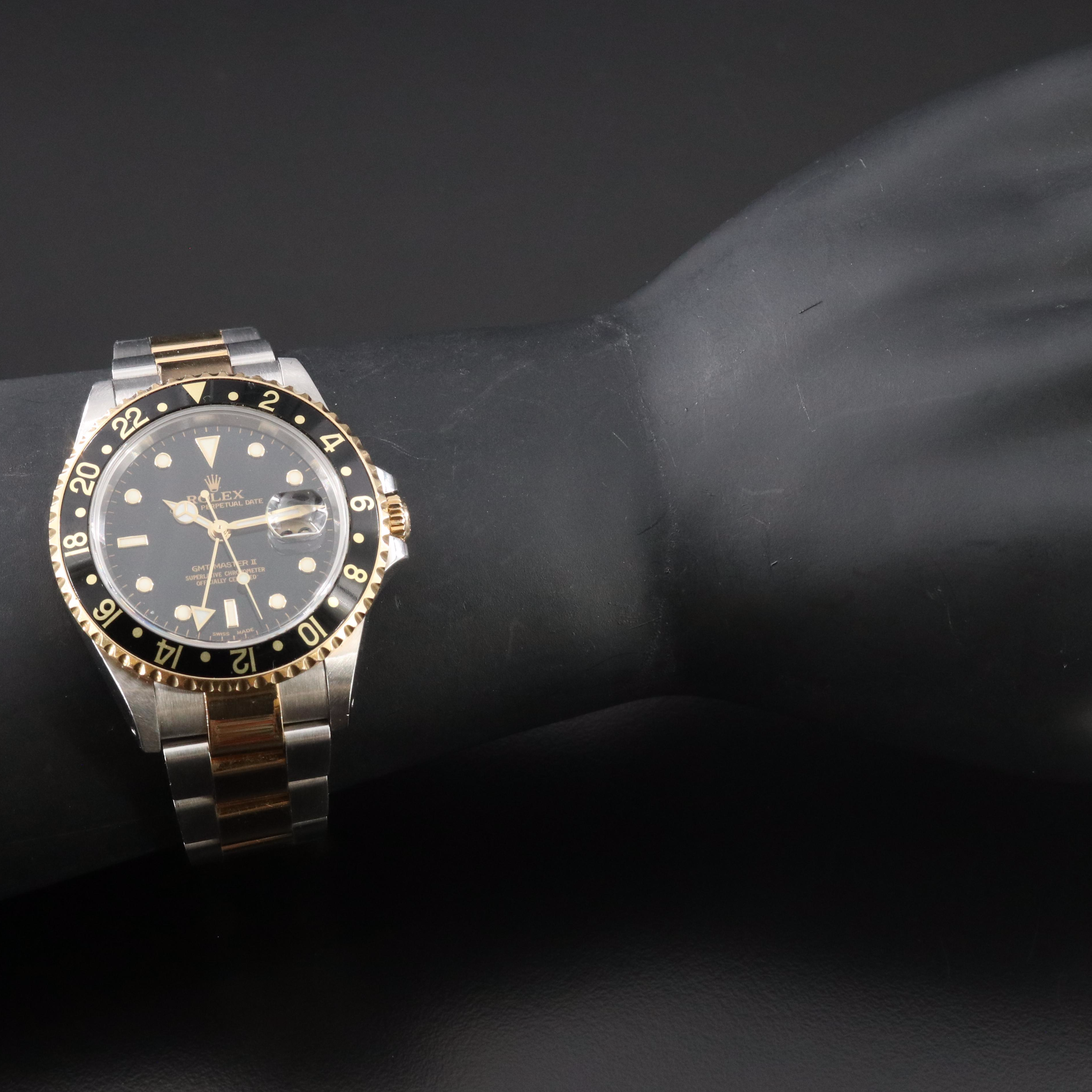 Rolex GMT-Master II 16713 Black 40mm 18k & Steel Automatic Watch circa 2000