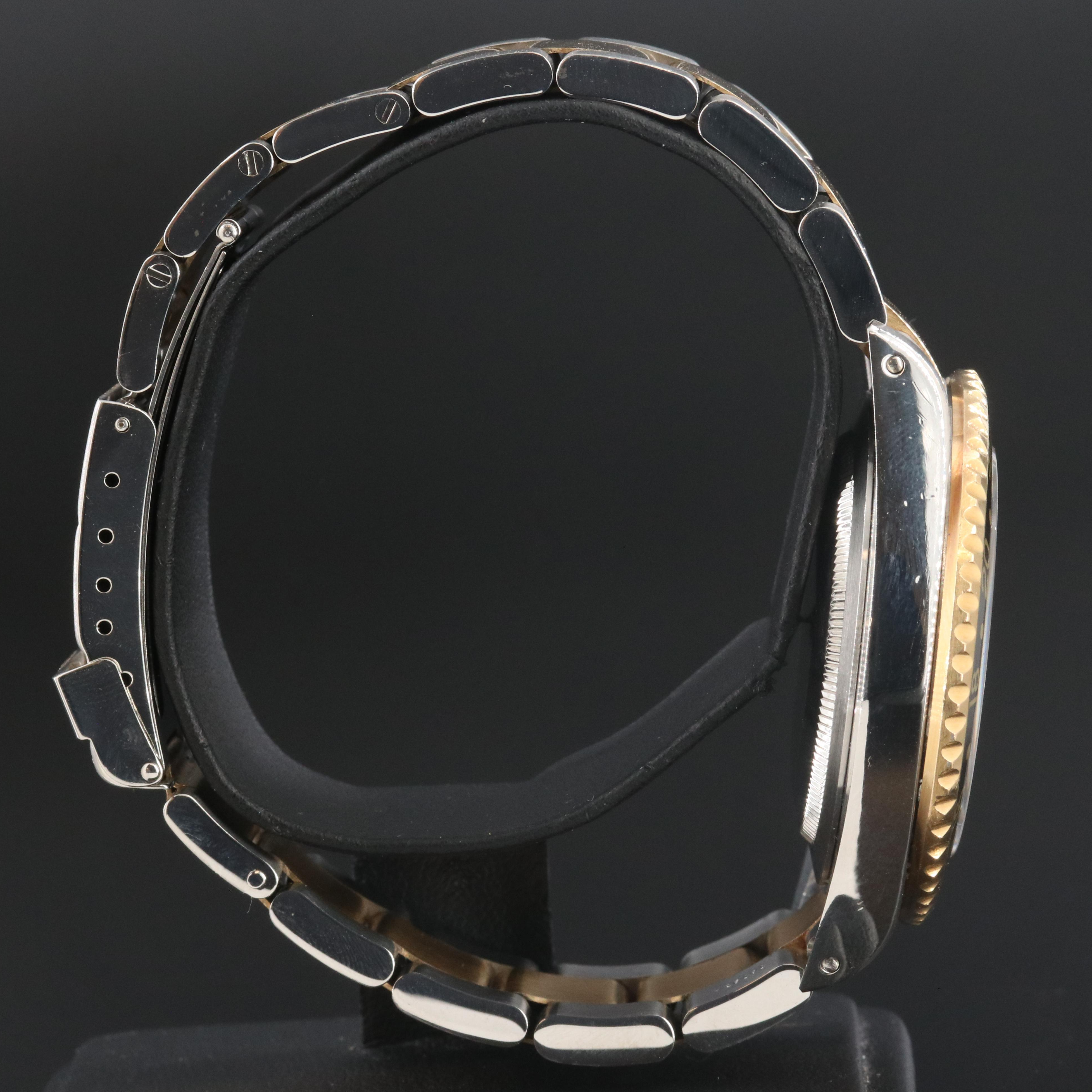 Rolex GMT-Master II 16713 Black 40mm 18k & Steel Automatic Watch circa 2000