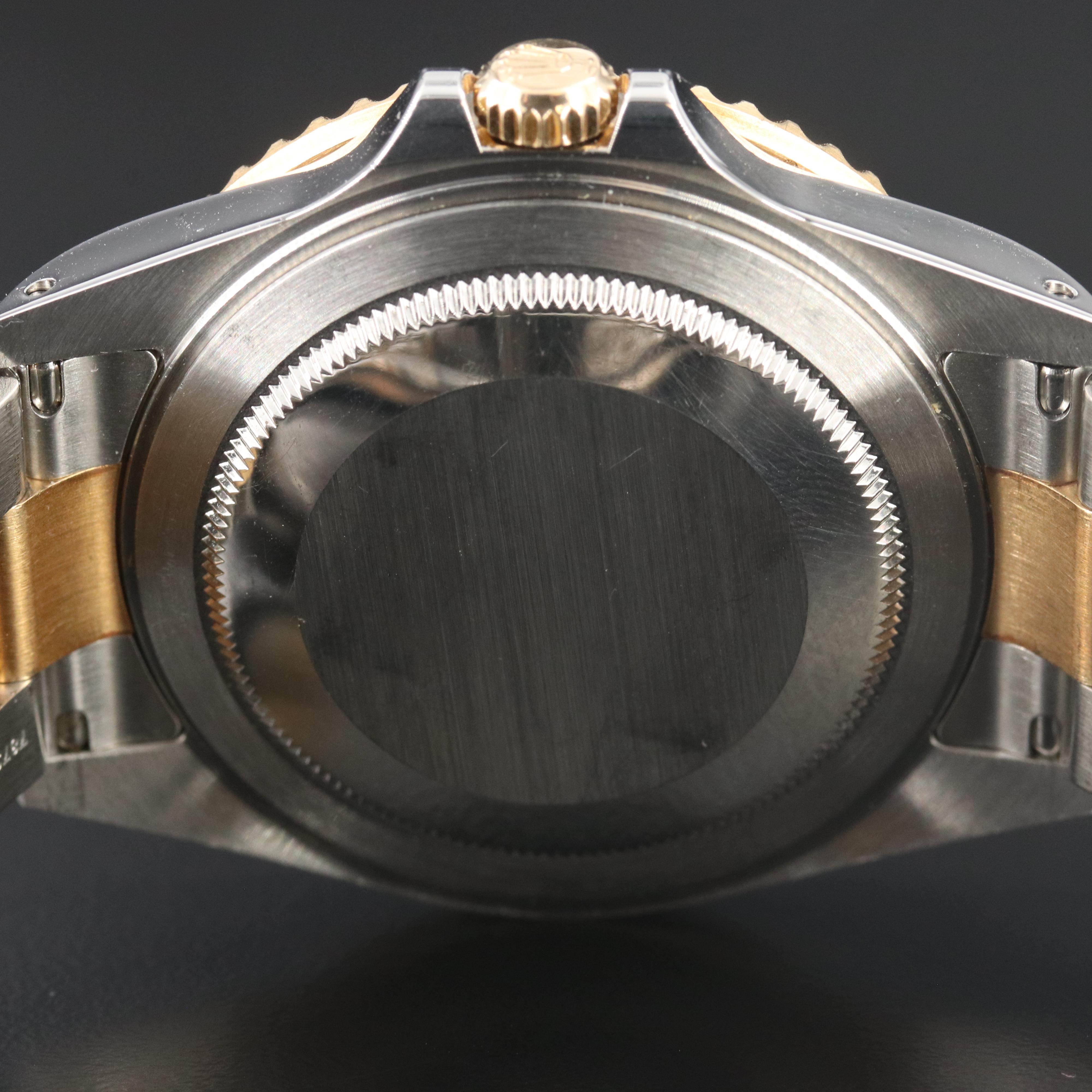 Rolex GMT-Master II 16713 Black 40mm 18k & Steel Automatic Watch circa 2000