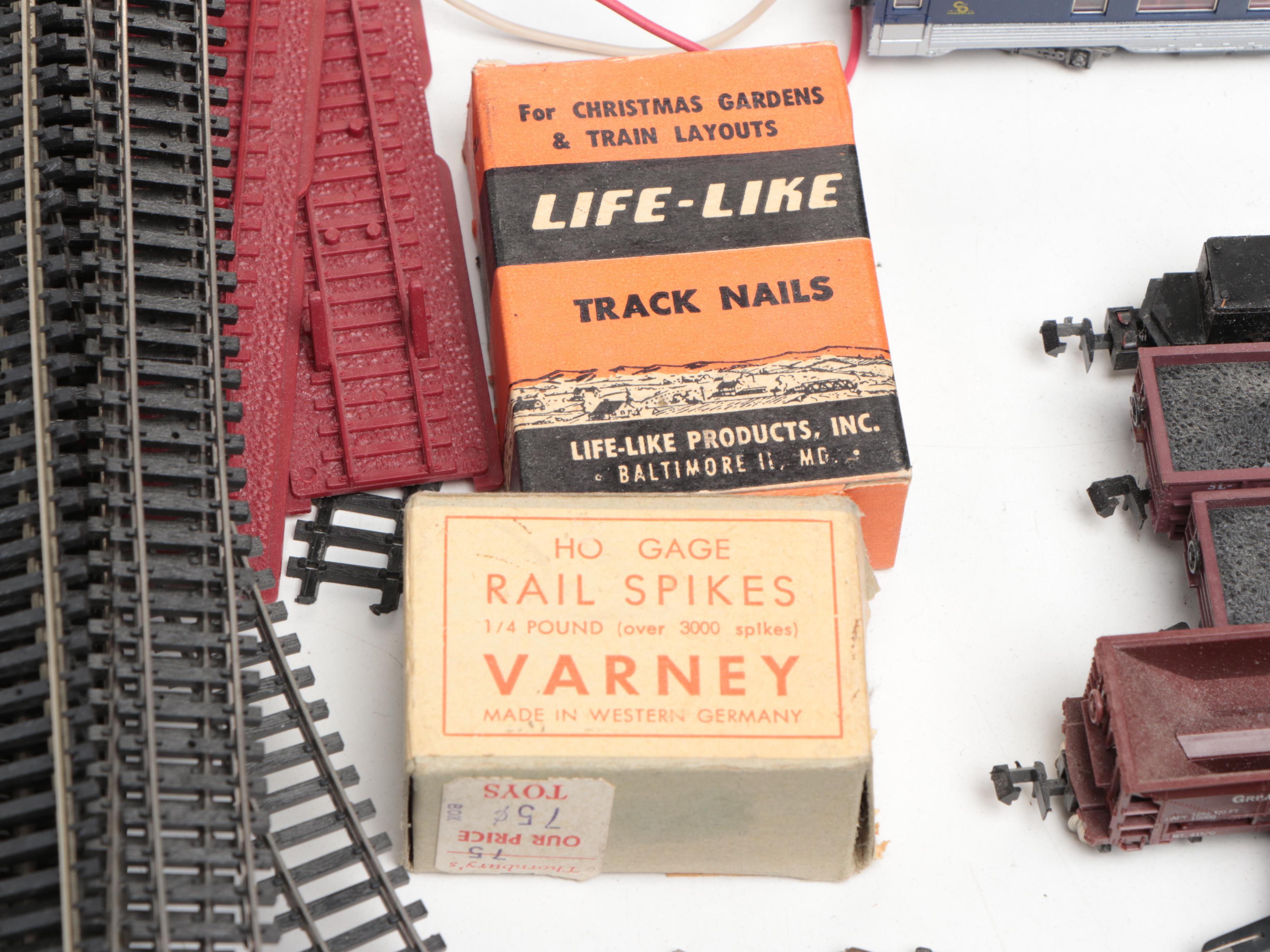 Aurora Postage Stamp Trains with Tracks, Dualpack Power Source and Accessories