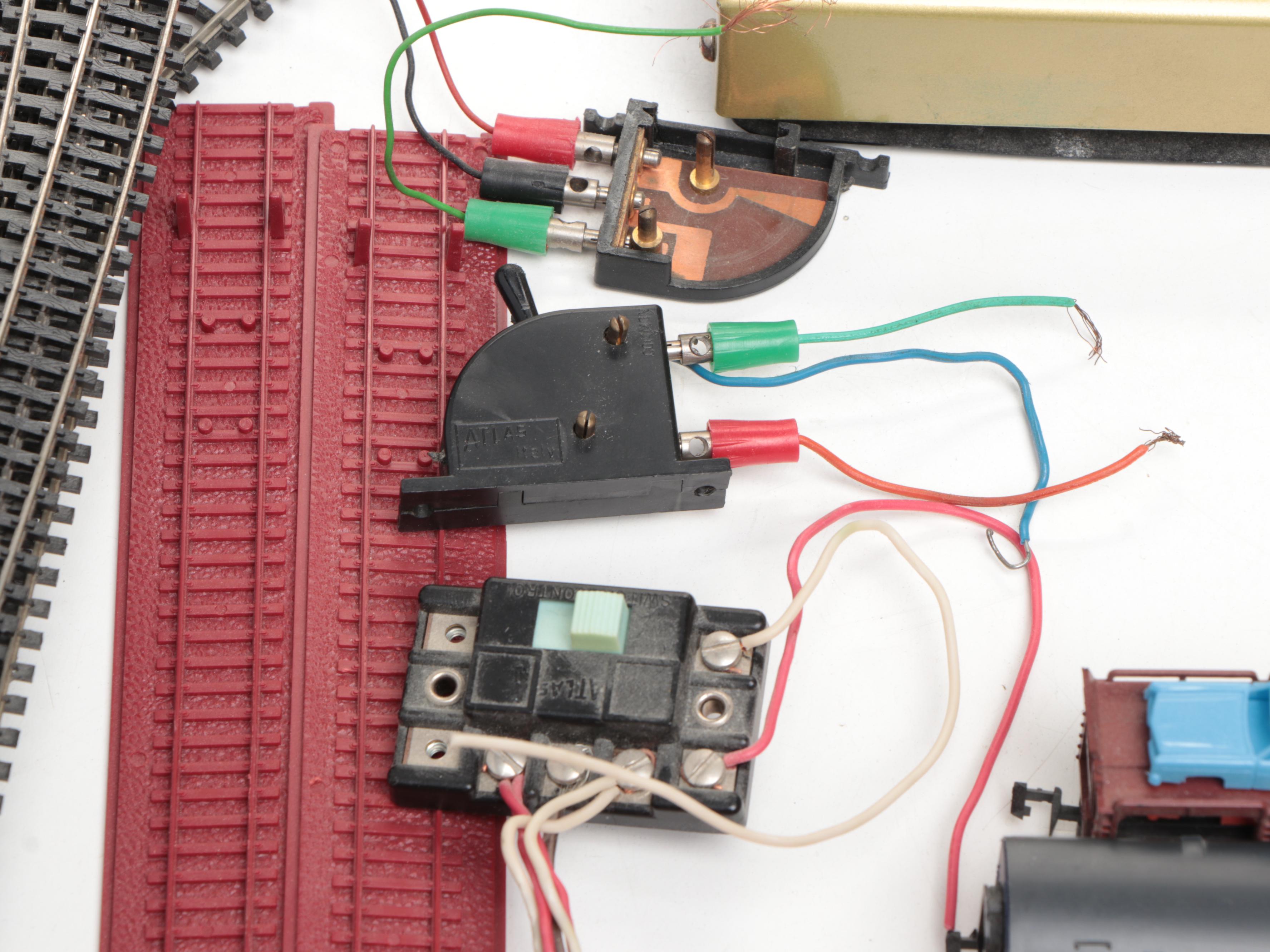 Aurora Postage Stamp Trains with Tracks, Dualpack Power Source and Accessories