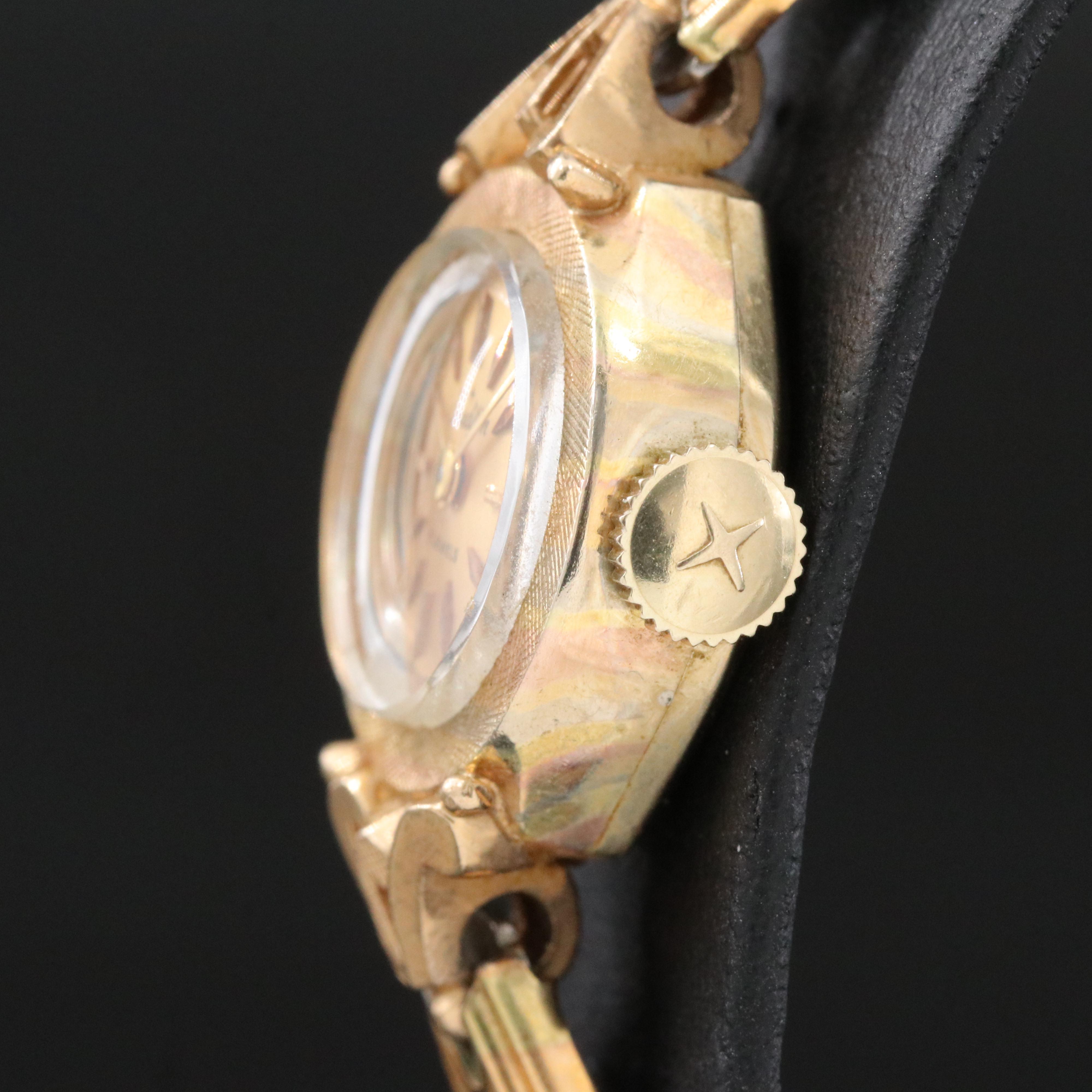 Vintage 14K Gold Tradition Watch Co. Champagne Dial 16mm Manual-Wind Watch