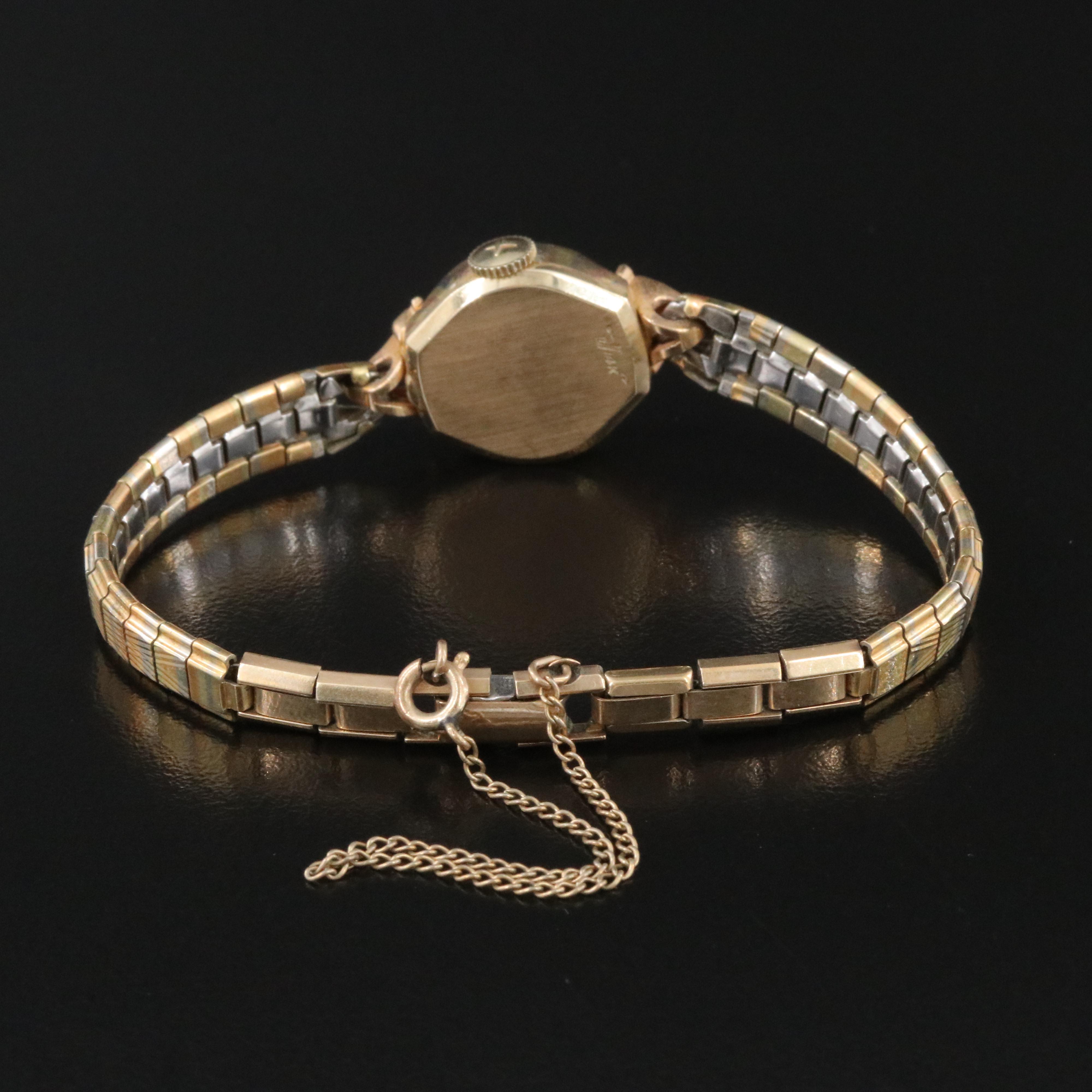 Vintage 14K Gold Tradition Watch Co. Champagne Dial 16mm Manual-Wind Watch