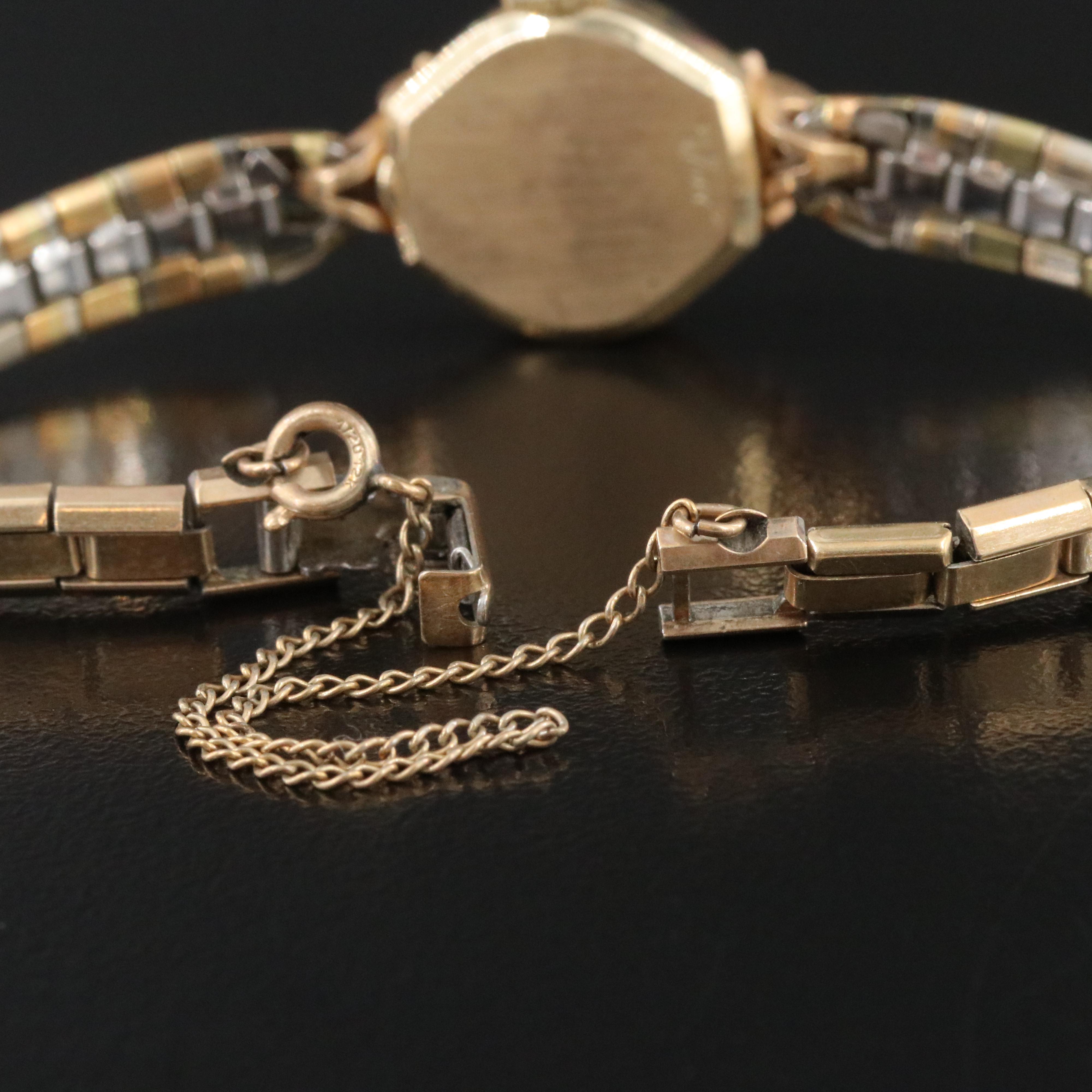 Vintage 14K Gold Tradition Watch Co. Champagne Dial 16mm Manual-Wind Watch