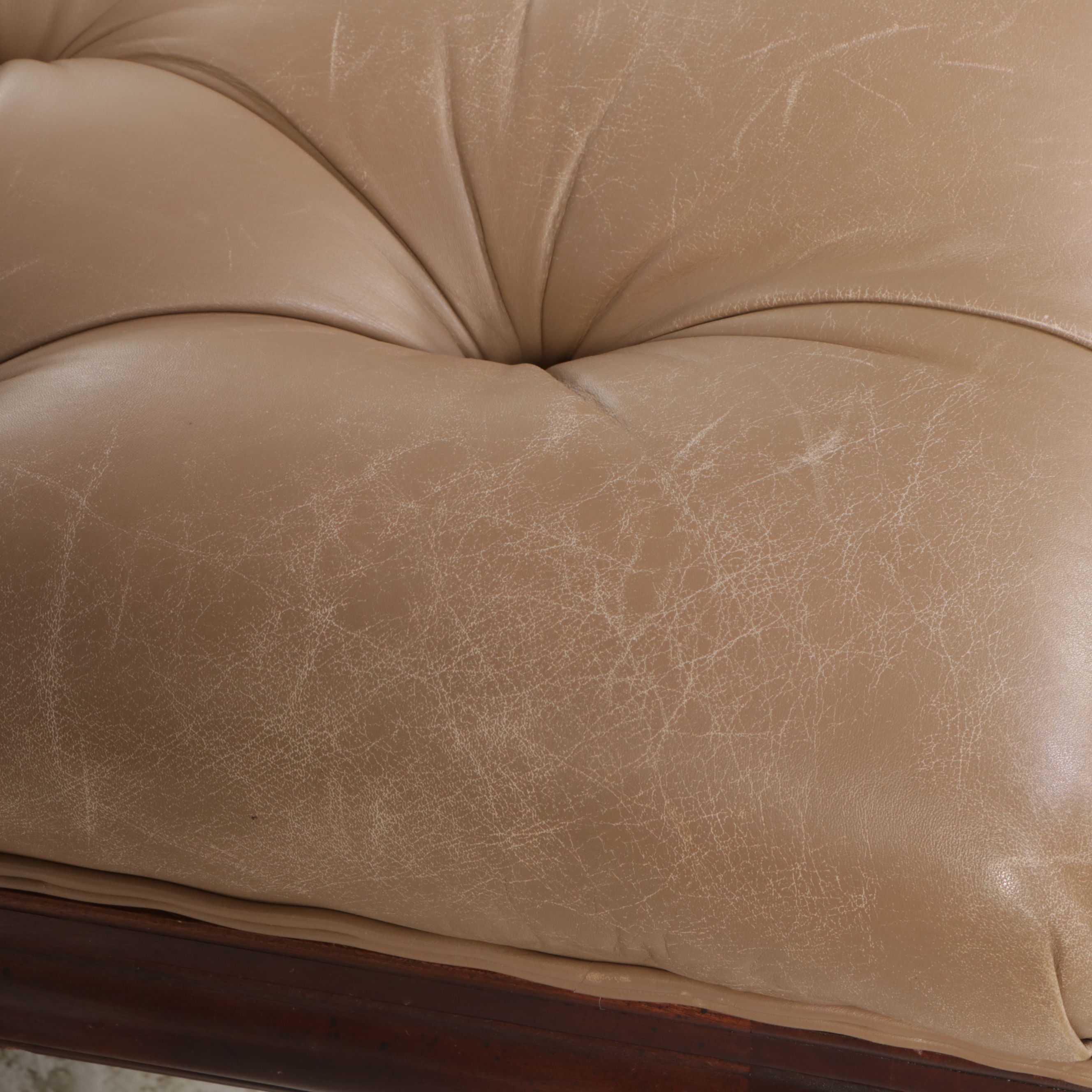 The Henredon Leather Co. Edwardian Style Tufted Leather and Carved Wood Ottoman