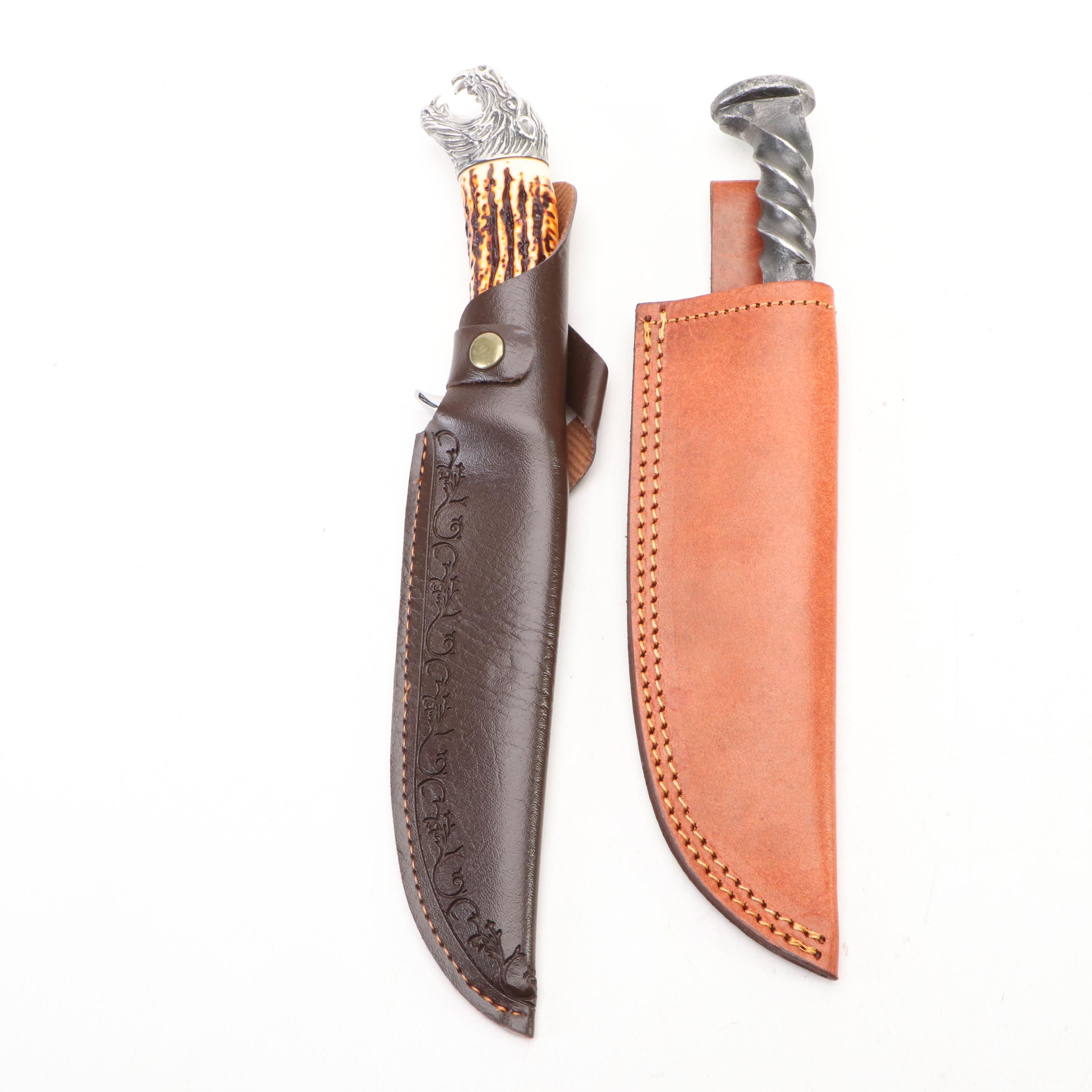 Wolf Head and and Twisted Metal Handled Fixed Blade Knives in Scabbards