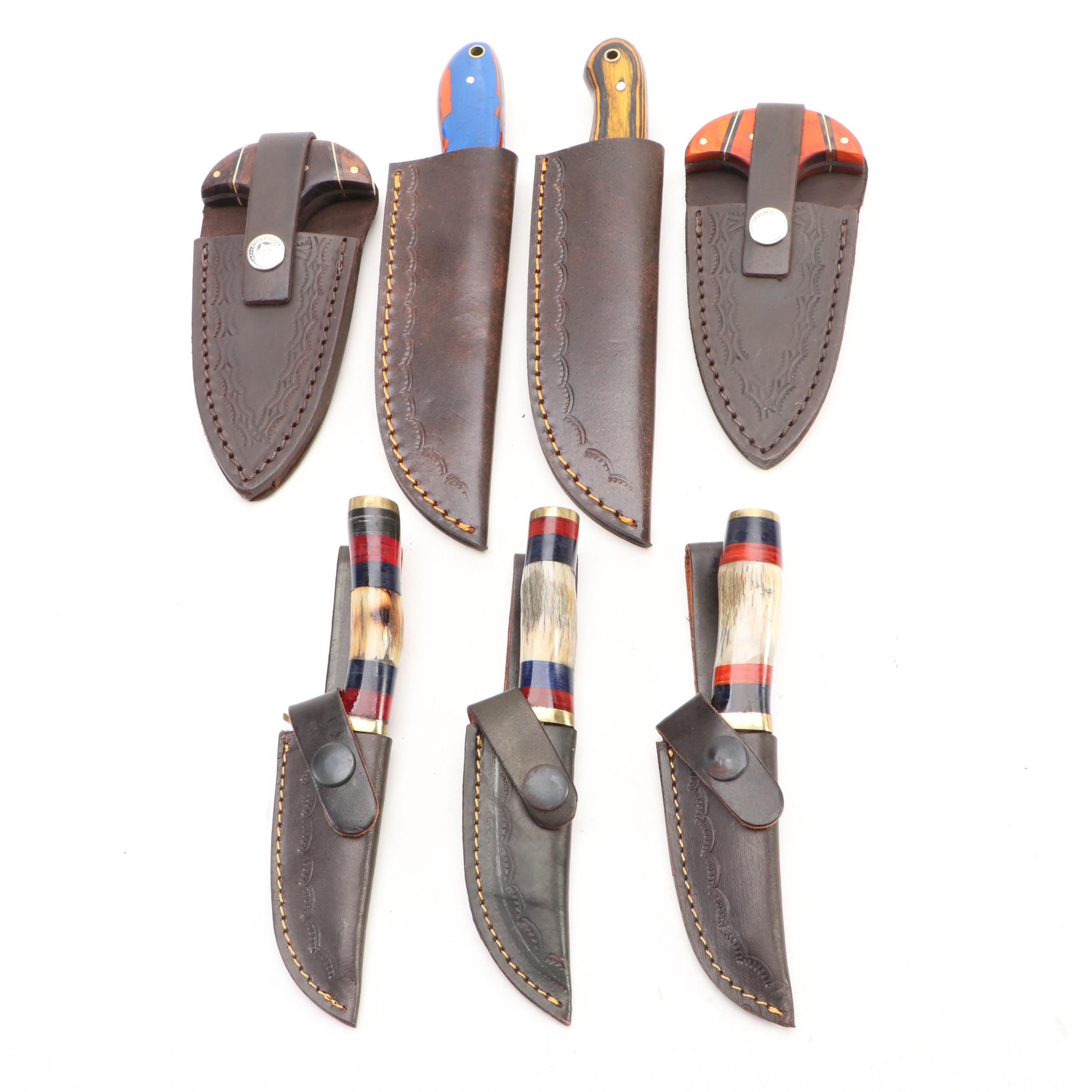 Damascus Steel Hunting and Skinner Knives in Leather Scabbards