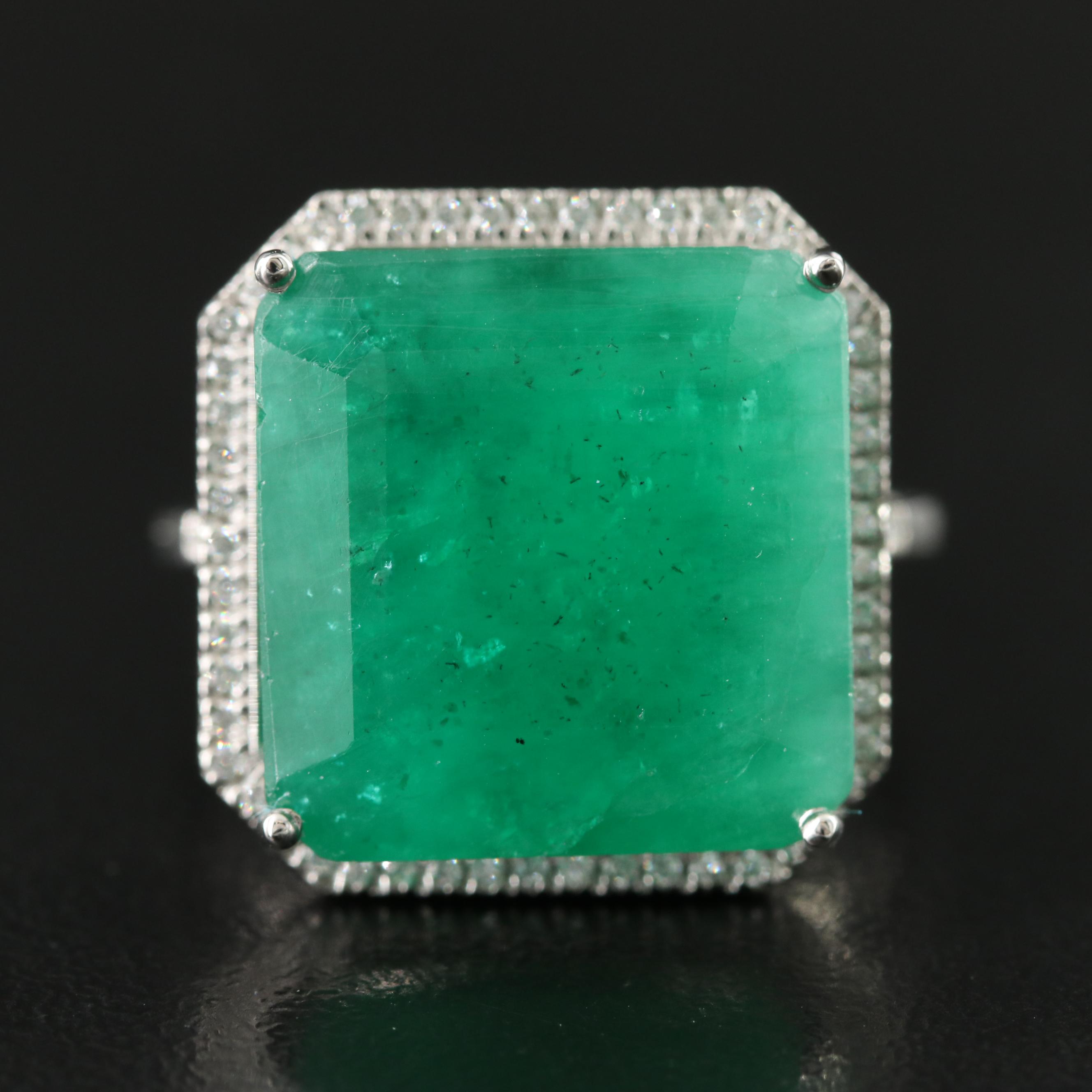 Platinum 16.88 CT Emerald and 0.17 CTW Diamond Ring