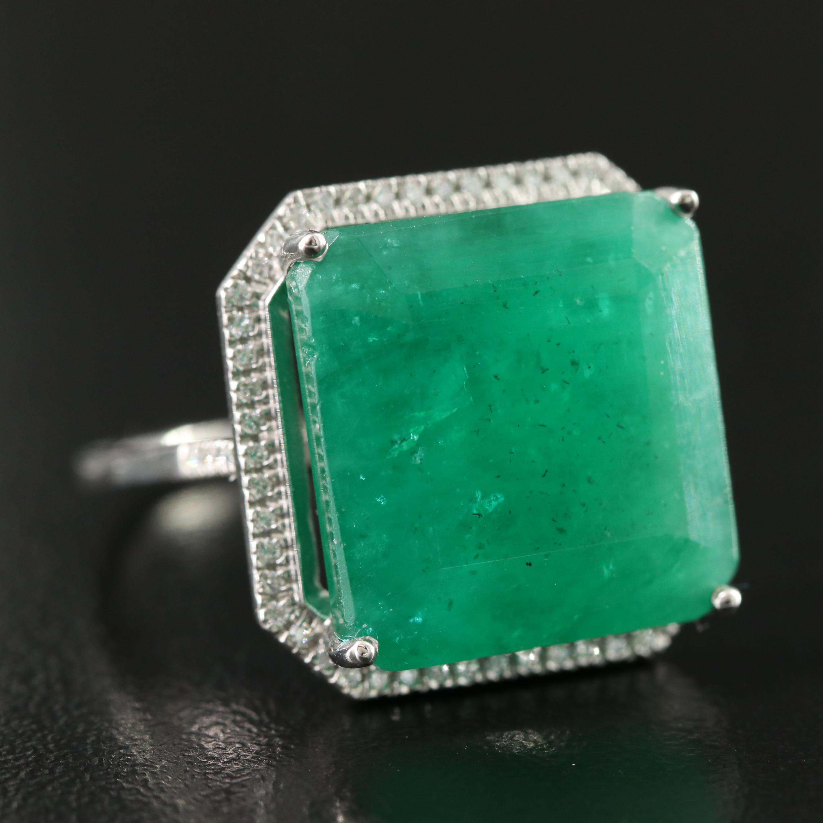Platinum 16.88 CT Emerald and 0.17 CTW Diamond Ring