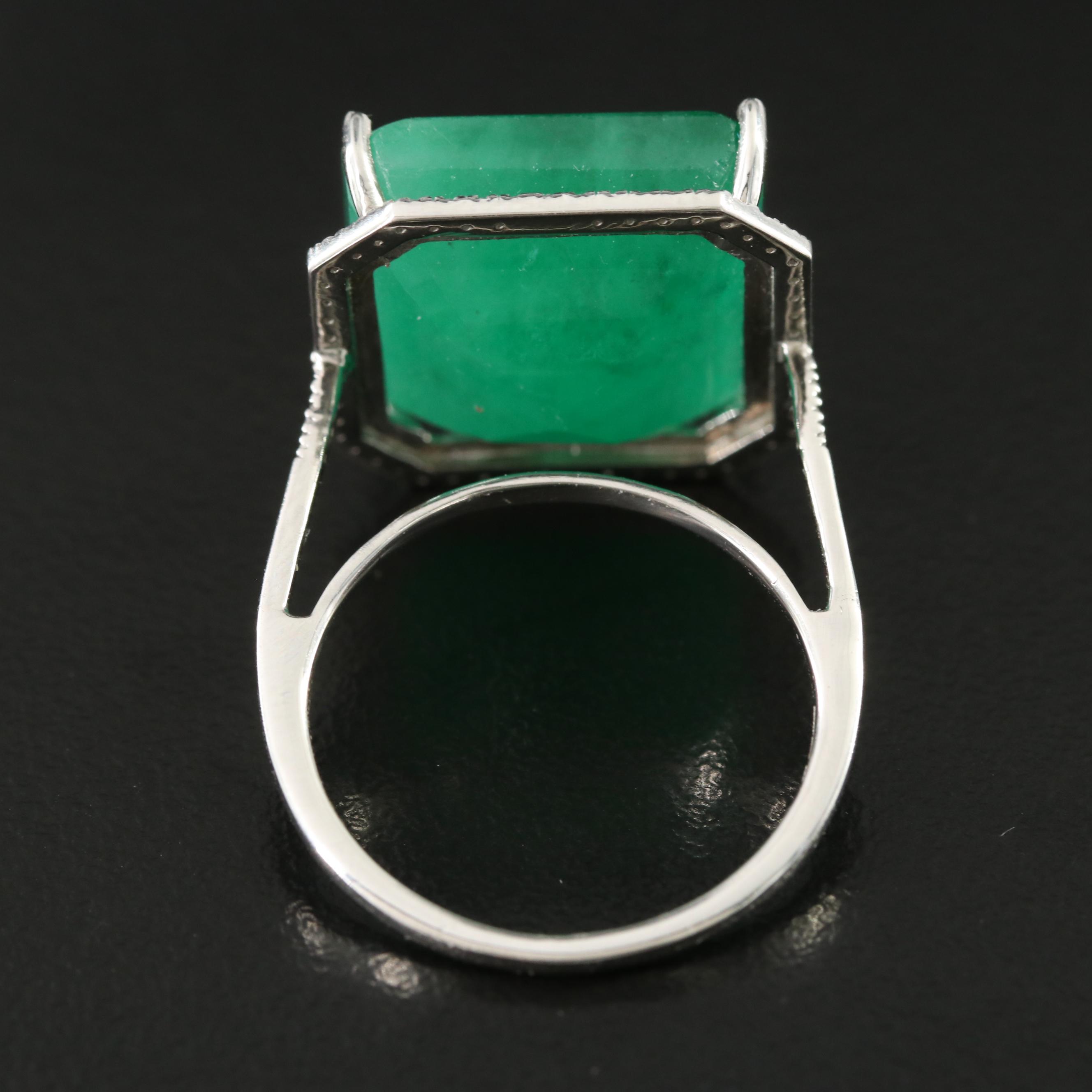 Platinum 16.88 CT Emerald and 0.17 CTW Diamond Ring