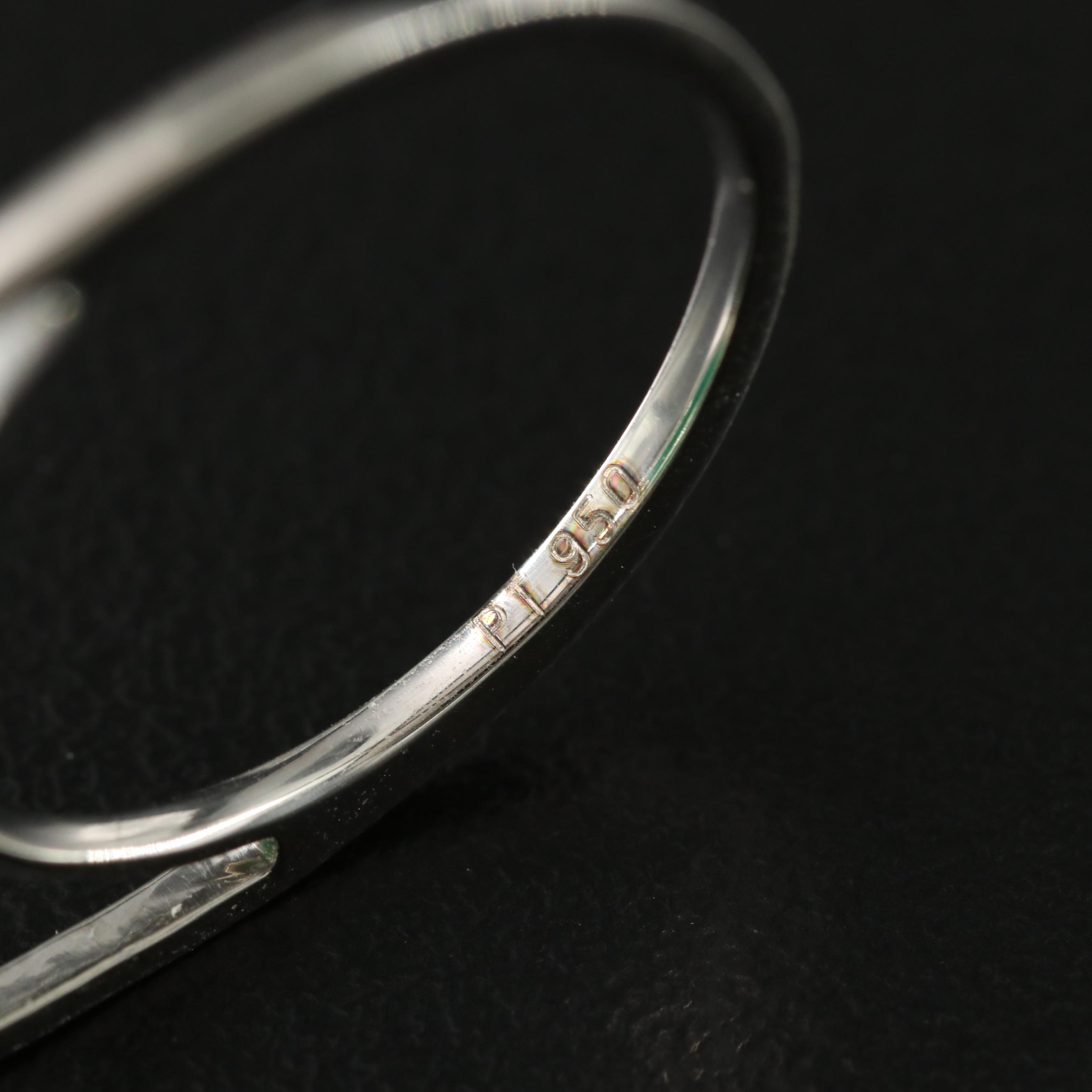 Platinum 16.88 CT Emerald and 0.17 CTW Diamond Ring